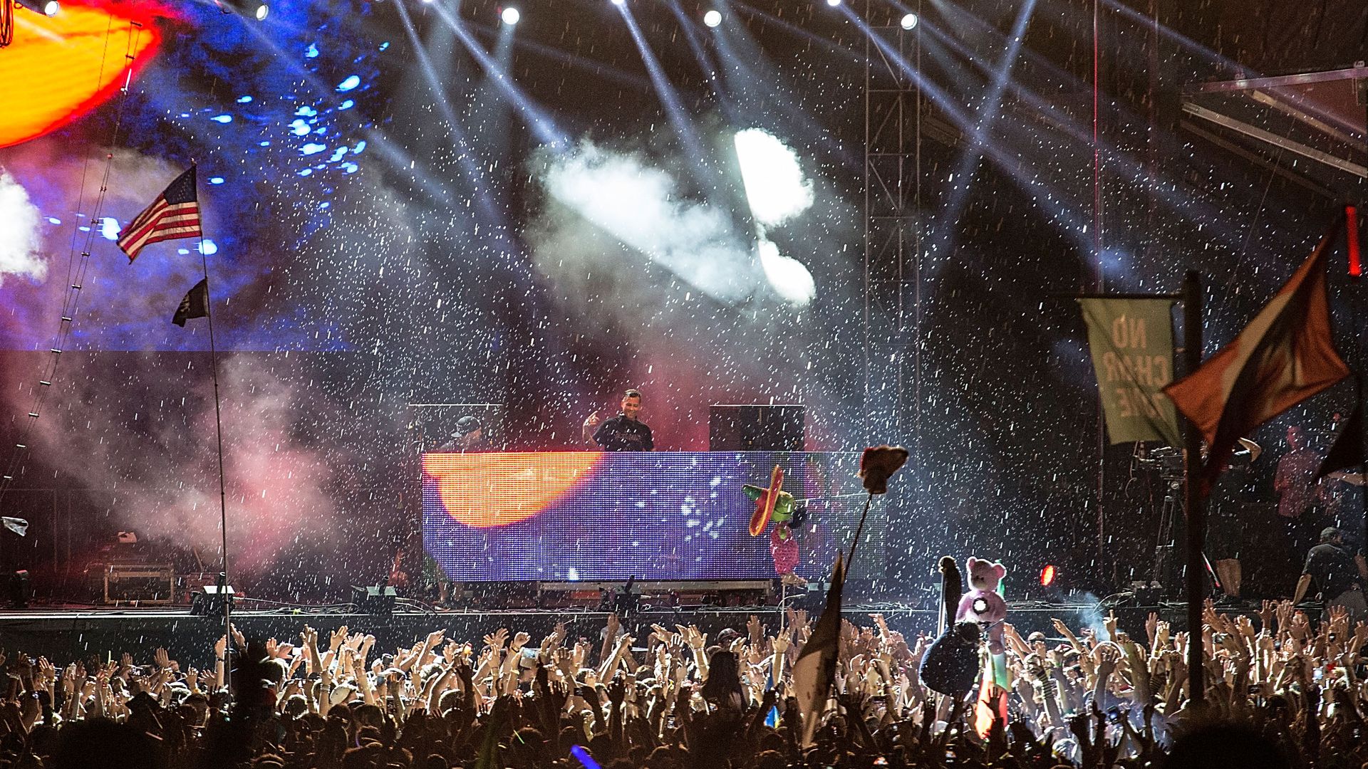 Kaskade performs in the rain during the 2013 ACL Festival