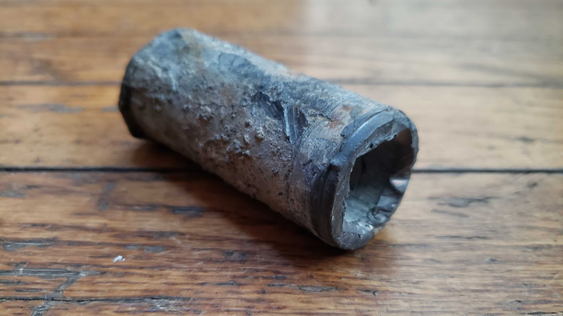 Photo of a lead water pipe.