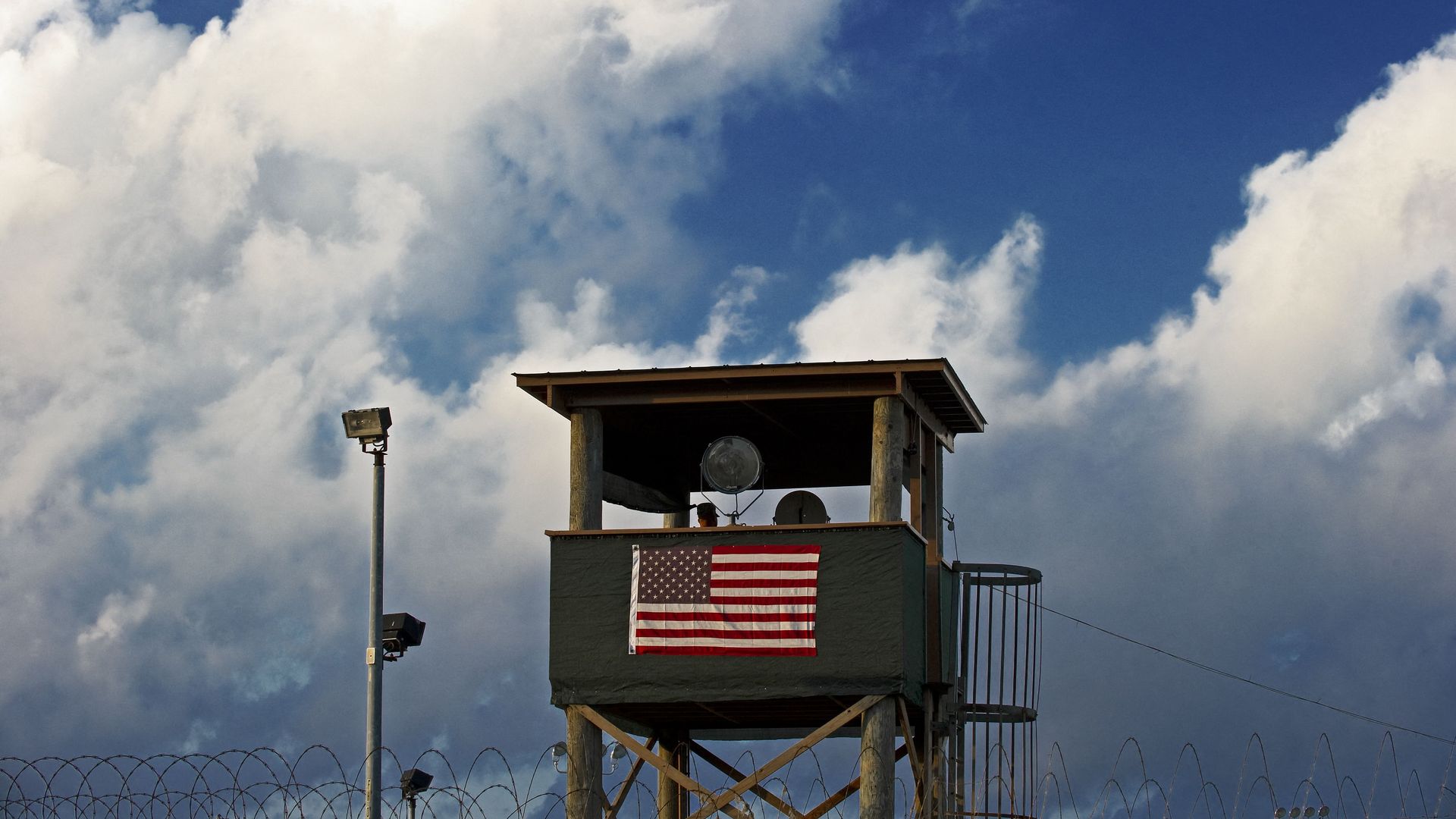Photo of a guard post with the American flag flying in the front