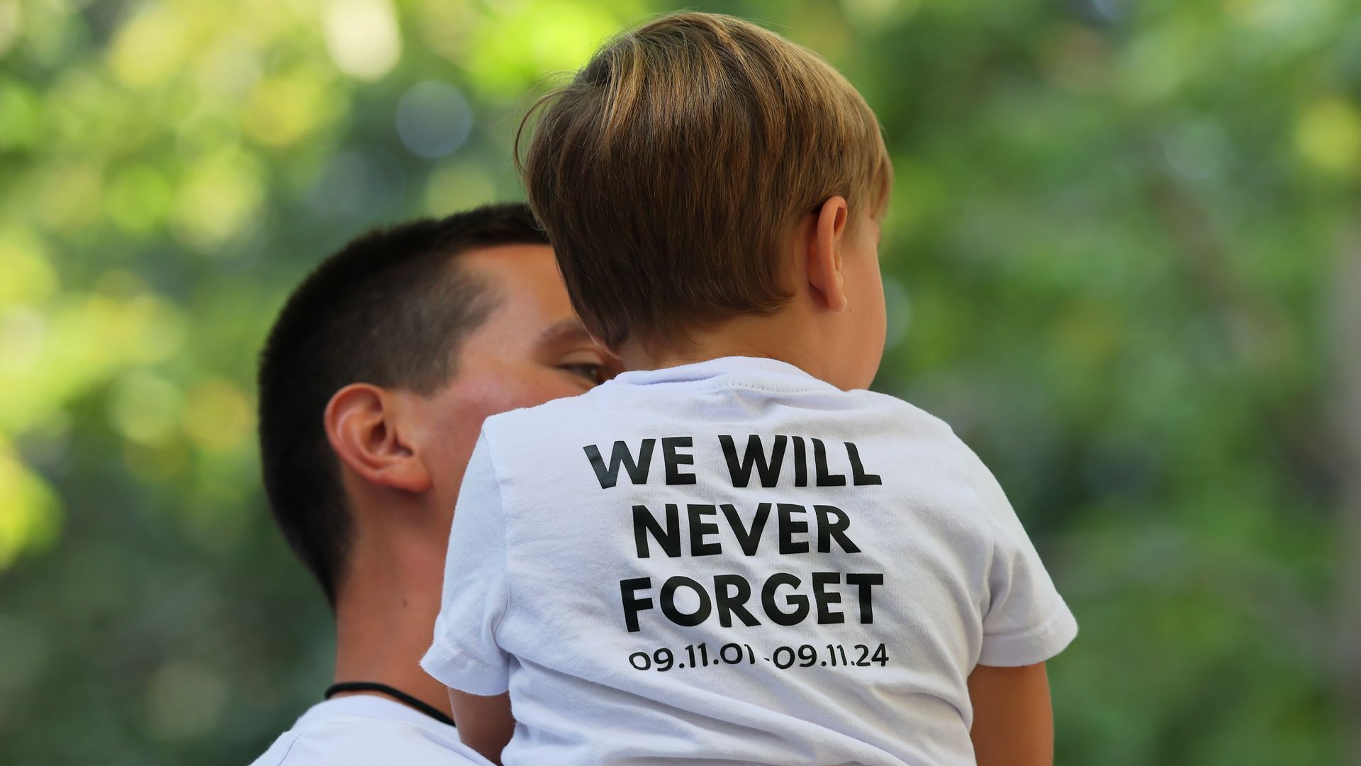 Family members and friends attend a 9/11 commemoration ceremony last year in New York City.