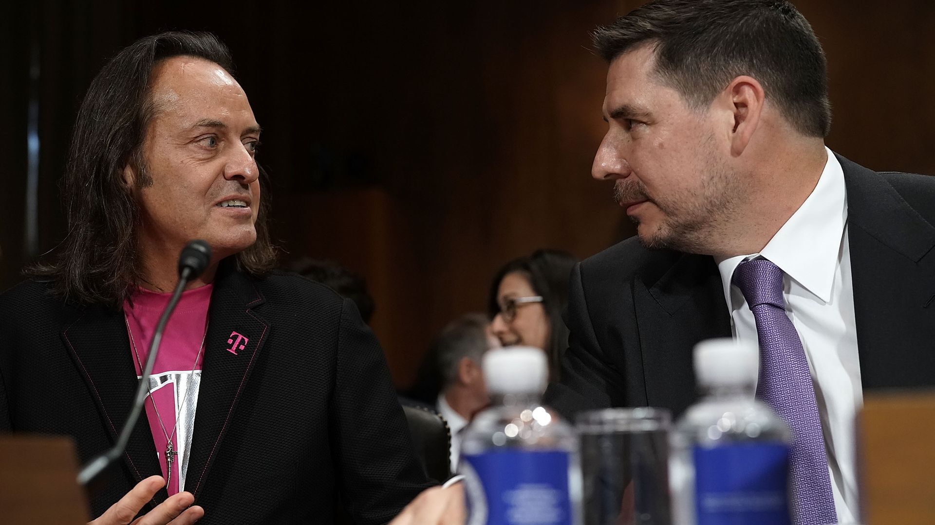 The chief executives of T-Mobile and Sprint