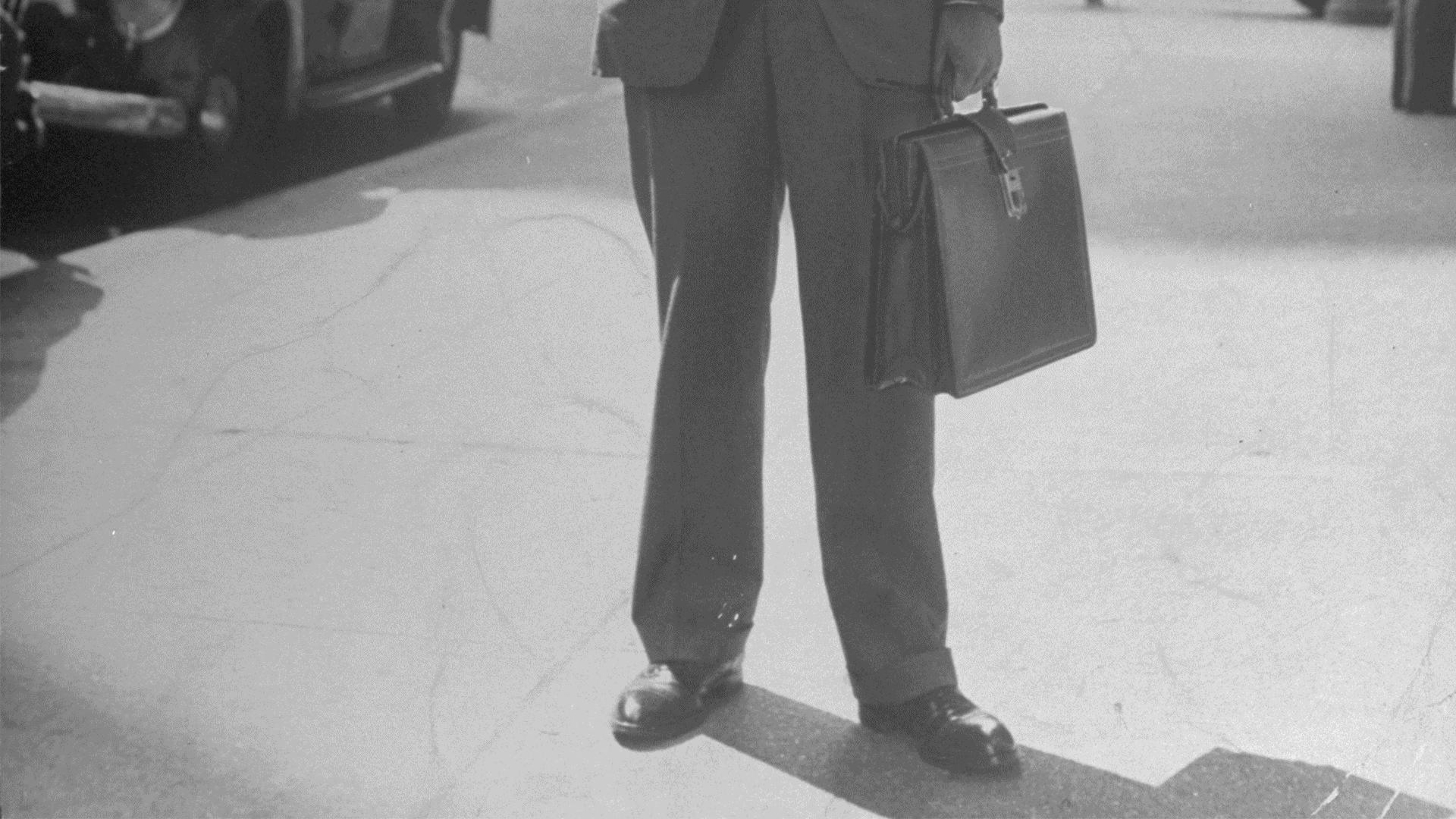 Illustration of businessman with glitching briefcase