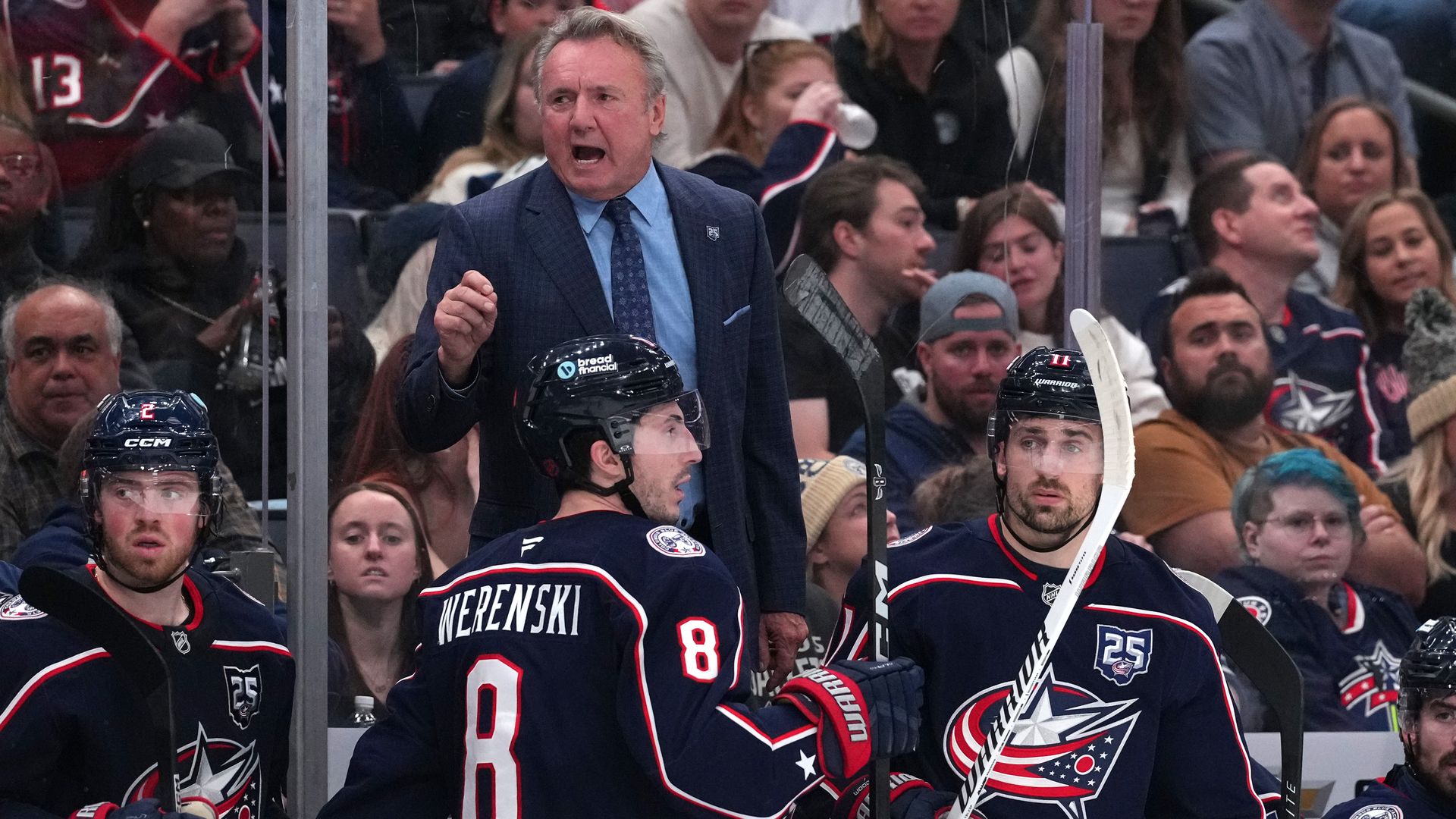 Blue Jackets head coach Rick Bowness shouts instructions to players on the bench.