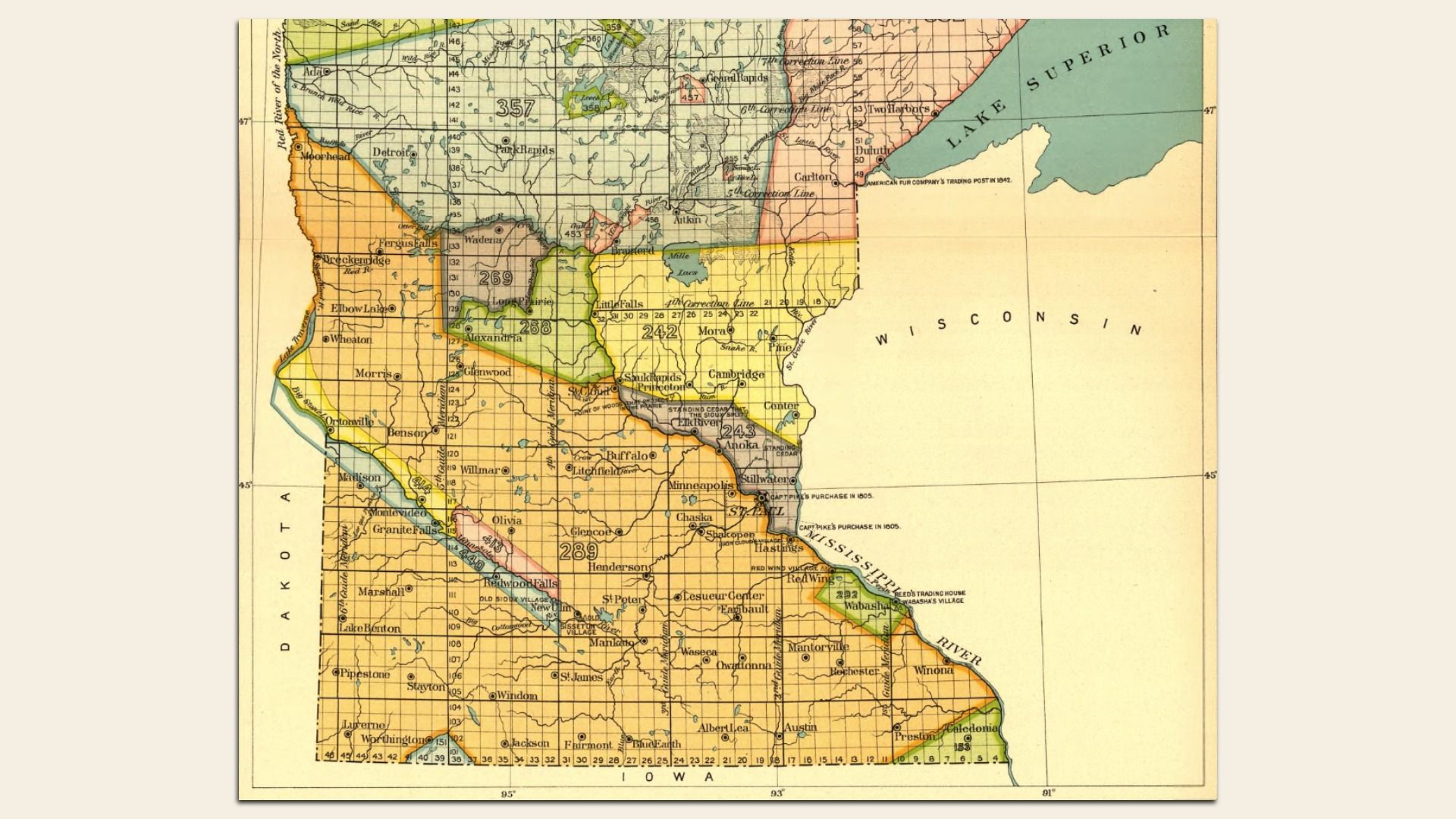 Vintage colorized map of the Upper Midwest focused on Wisconsin, Minnesota, and Iowa, with Lake Superior to the northeast; counties shaded in orange, yellow, green.