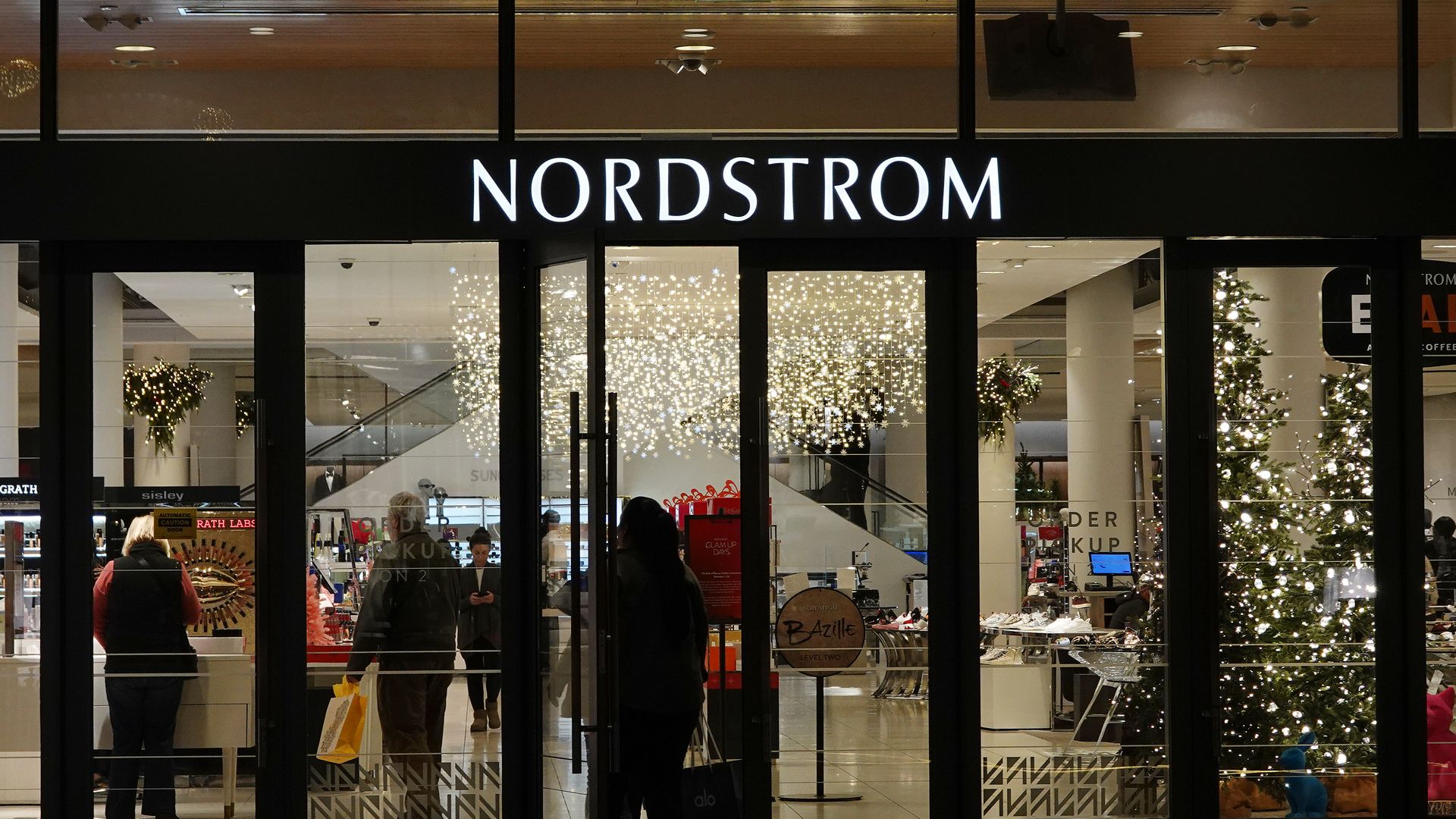 Picture of Nordstrom storefront decorated for holidays.