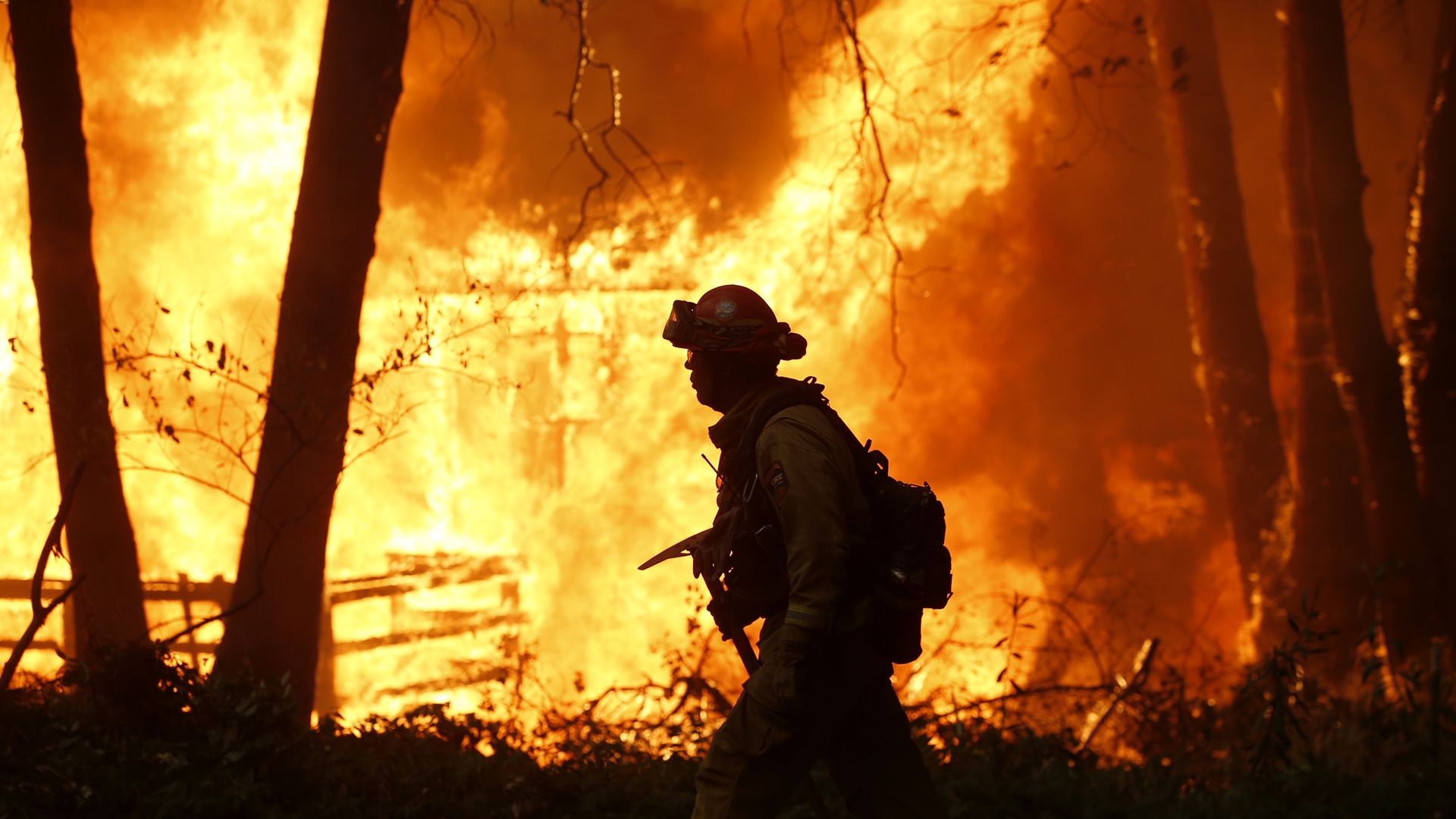 NOVEMBER 09: Sacramento Metropolitan firefighters battle the Camp Fire in Magalia, Calif., Friday, November 9, 2018. 