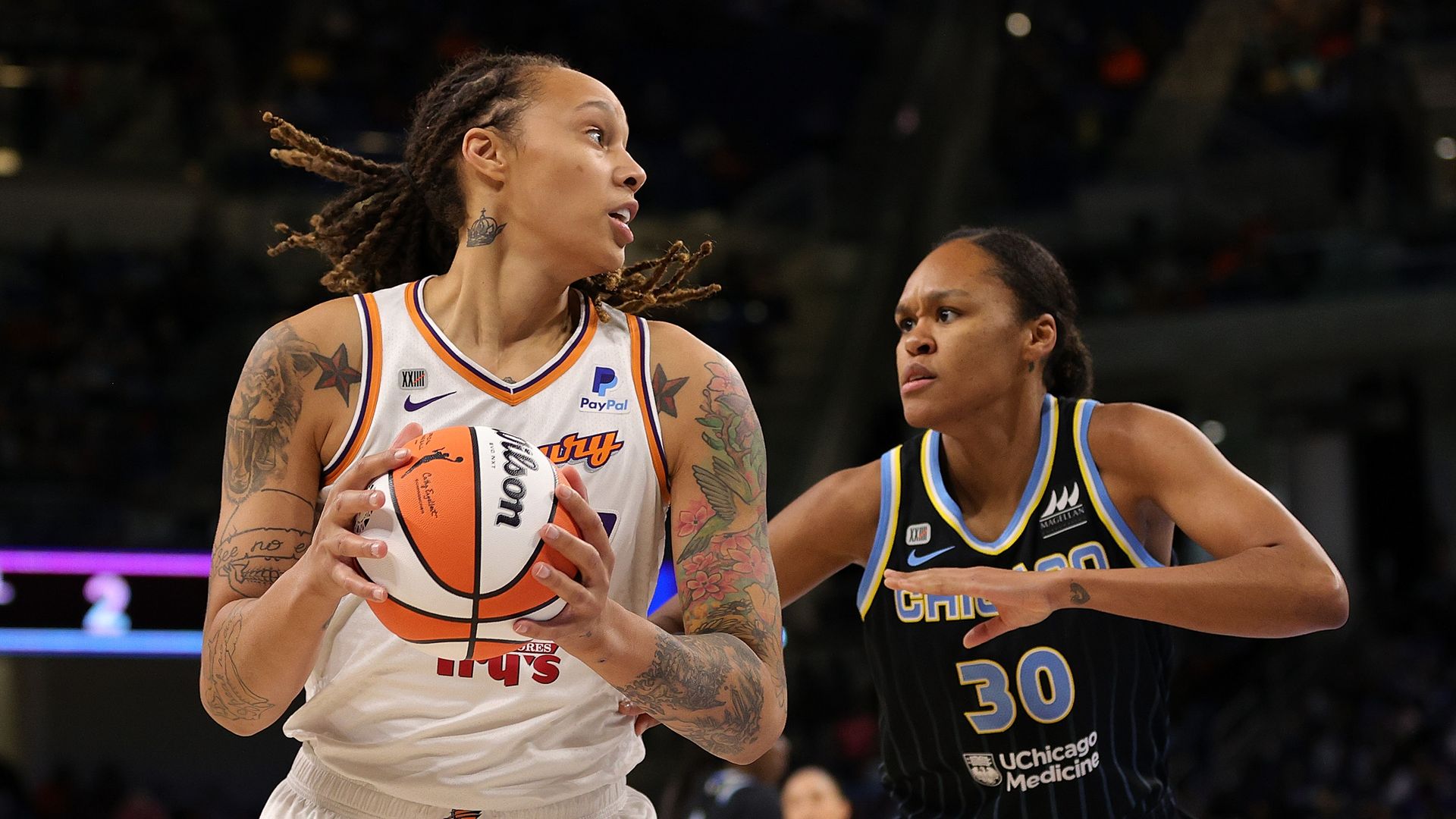 Phoenix Mercury star Brittney Griner defended by Azurá Stevens of the Chicago Sky.