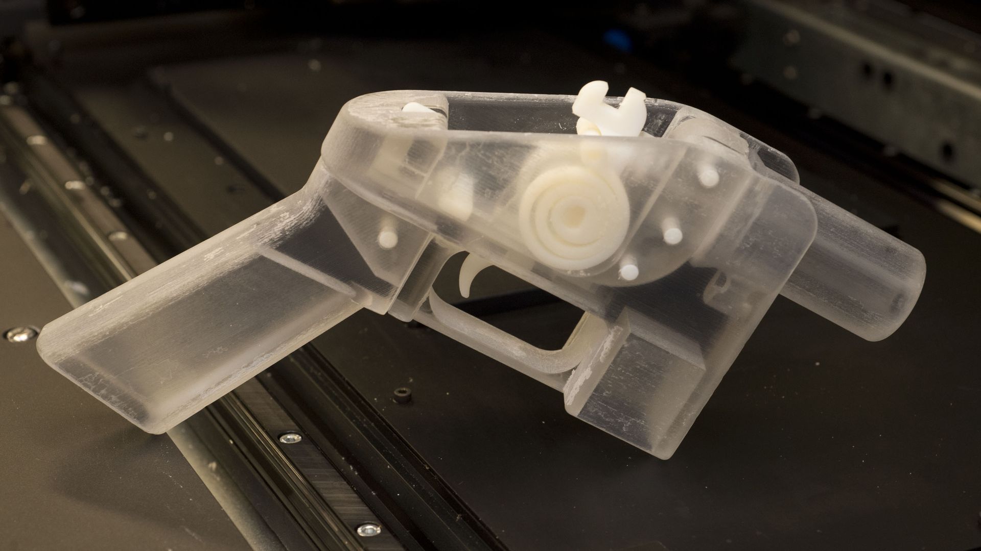Daniel Southwick shows off a gun made by a 3D printer. Photo: Keith Beaty/Toronto Star via Getty Images