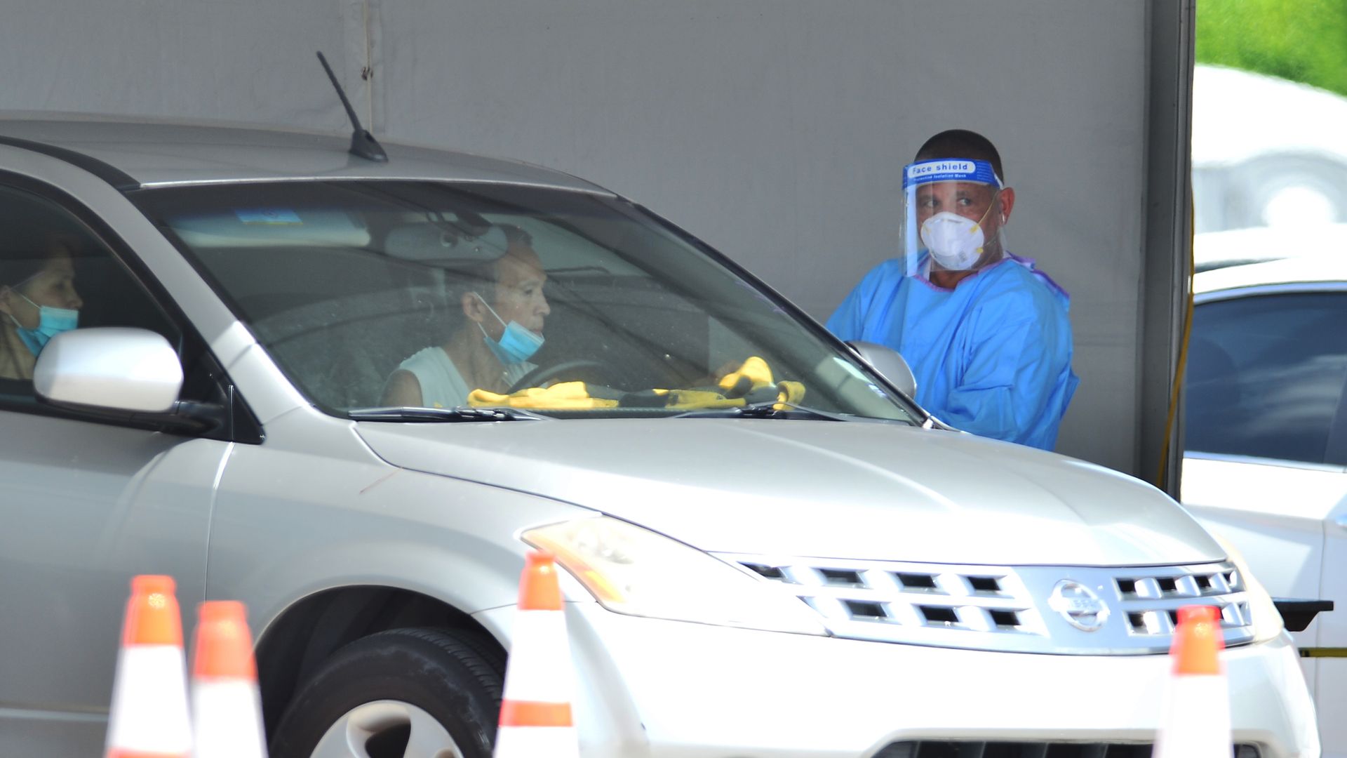 A health care worker administering a coronavirus test on June 27.