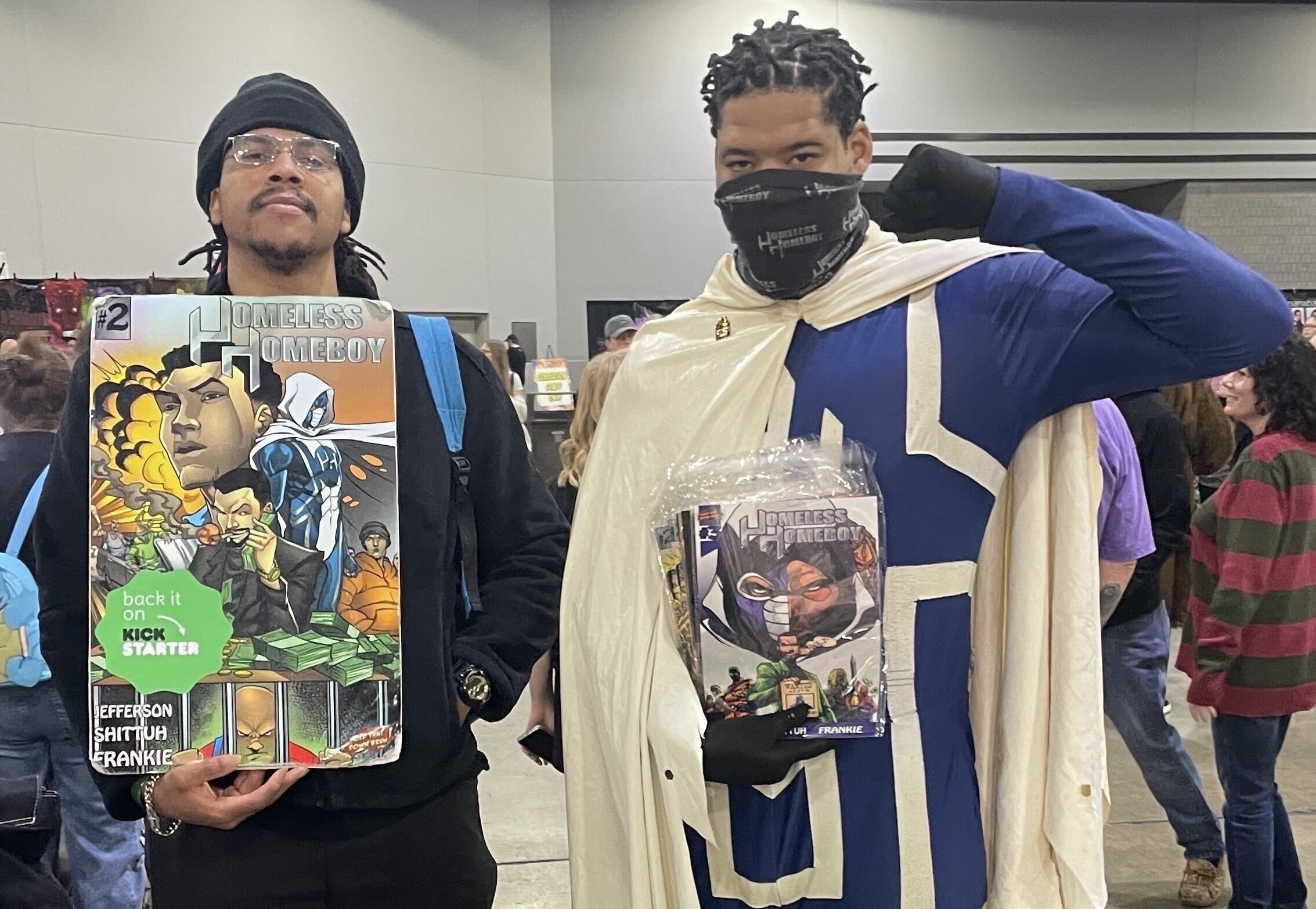 Derek Jefferson (right) dressed as the superhero from his own comic book series, "Homeless Homeboy"