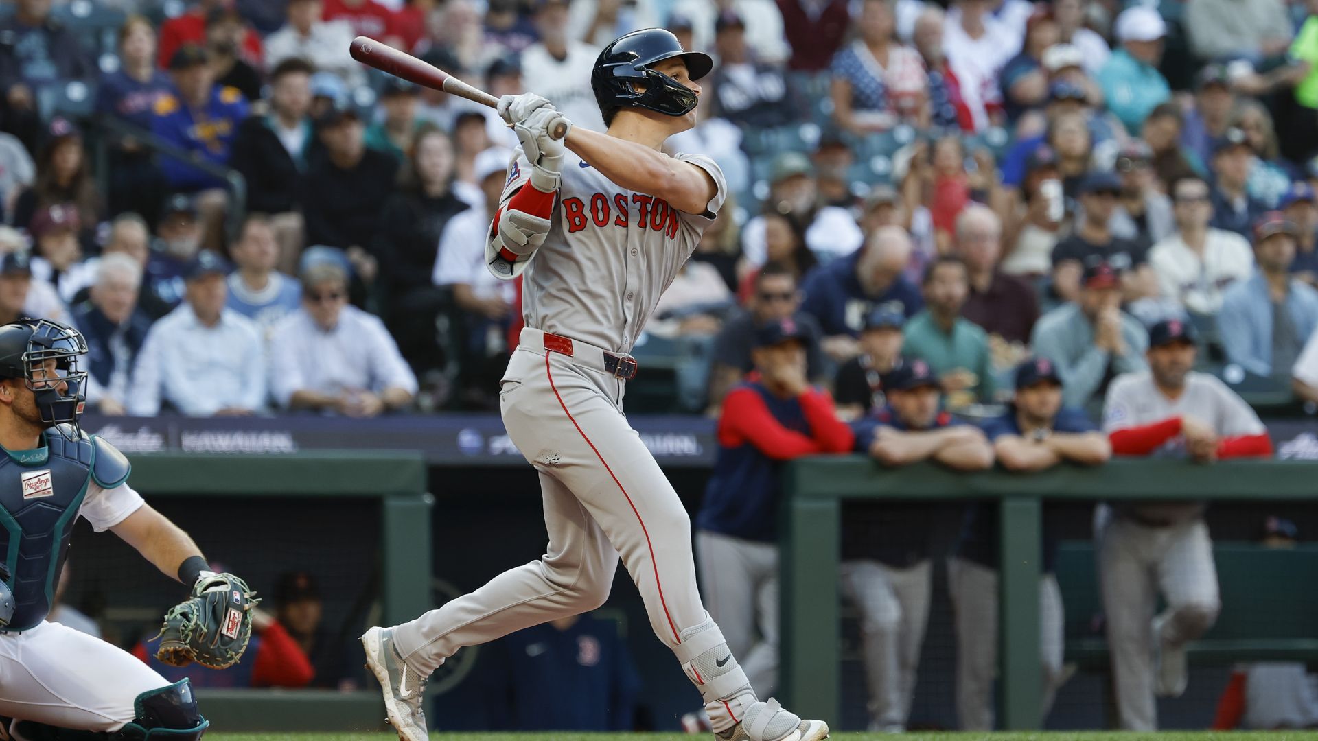  Roman Anthony #19 of the Boston Red Sox hits a solo home run during the first inning against the Seattle Mariners at T-Mobile Park on June 16, 2025 in Seattle, Washington. 