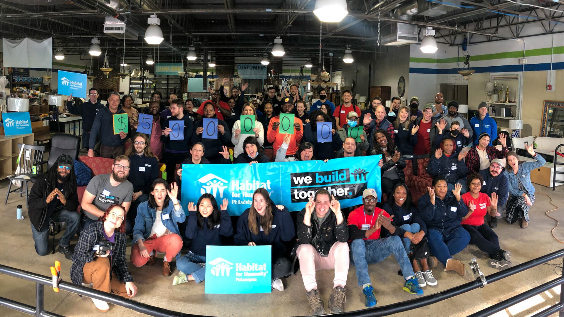 Members of Habitat for Humanity gathered together