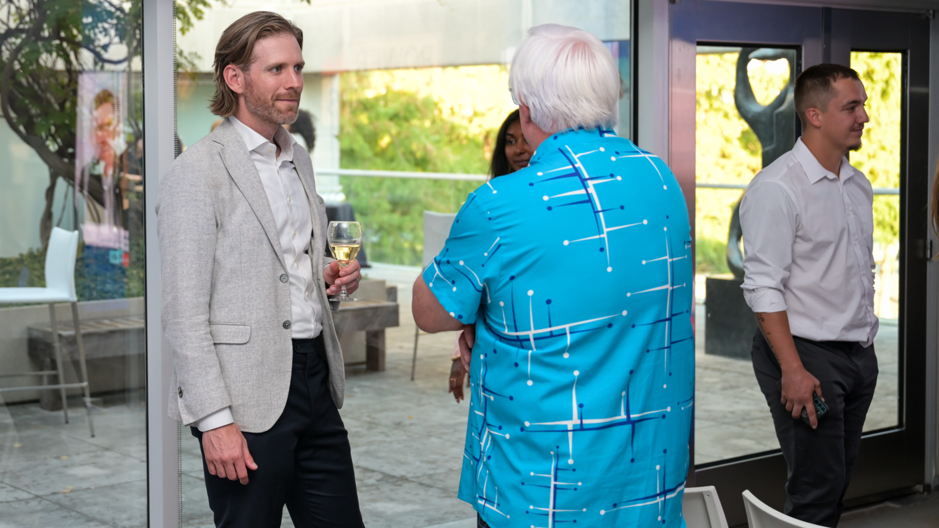 People talk at an event