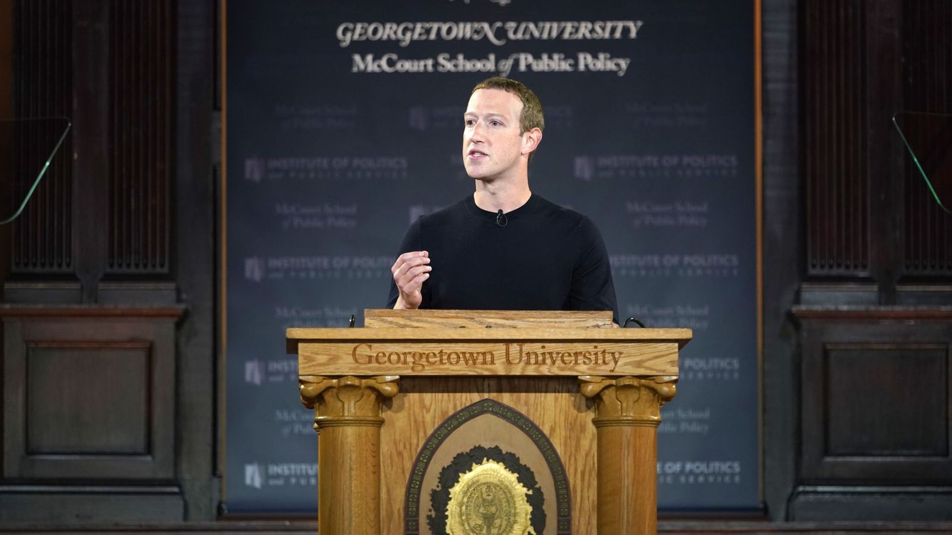 Photo of Facebook CEO Mark Zuckerberg speaking at a Georgetown University lectern