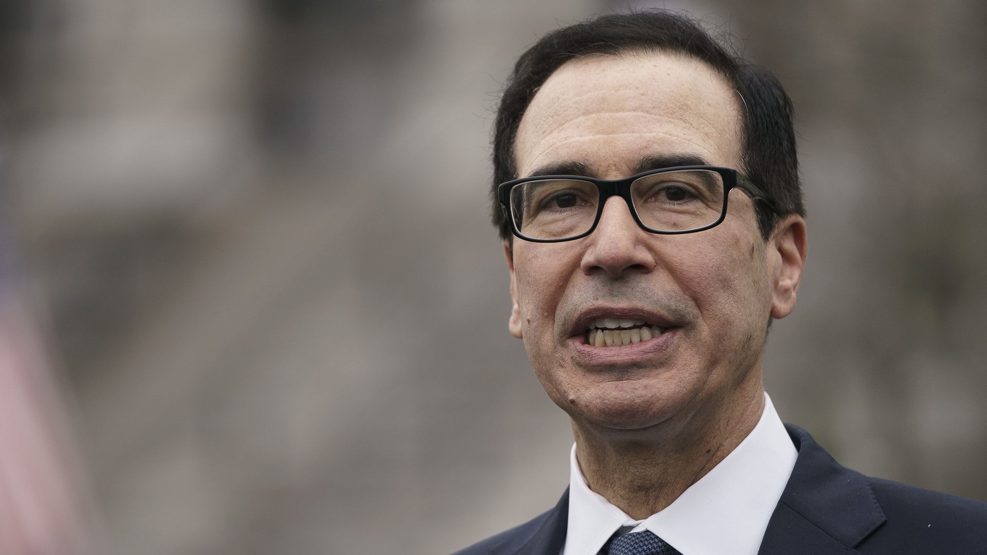 Treasury Secretary Steven Mnuchin speaks to the press outside of the West Wing of the White House