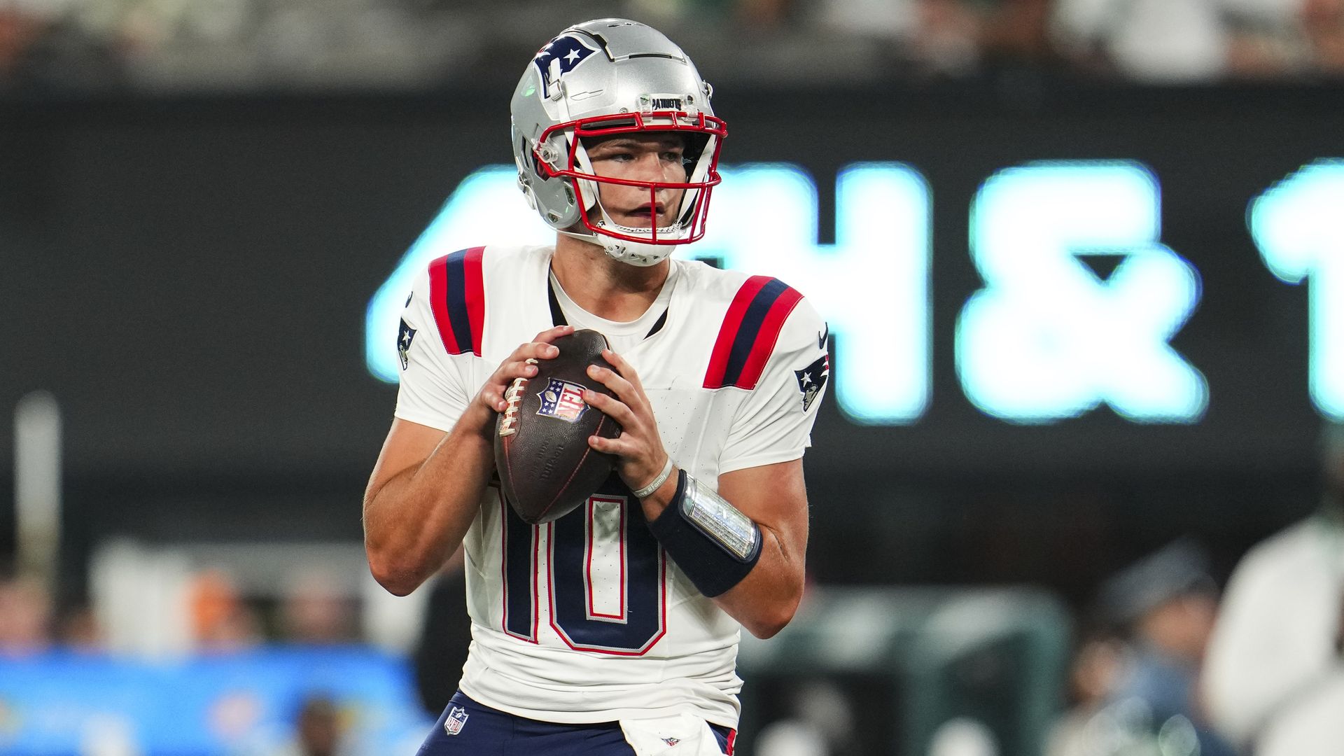 Drake Maye #10 of the New England Patriots drops back to pass during an NFL football game against the New York Jets at MetLife Stadium on September 19, 2024 in East Rutherford, New Jersey. (Photo by Cooper Neill/Getty Images)