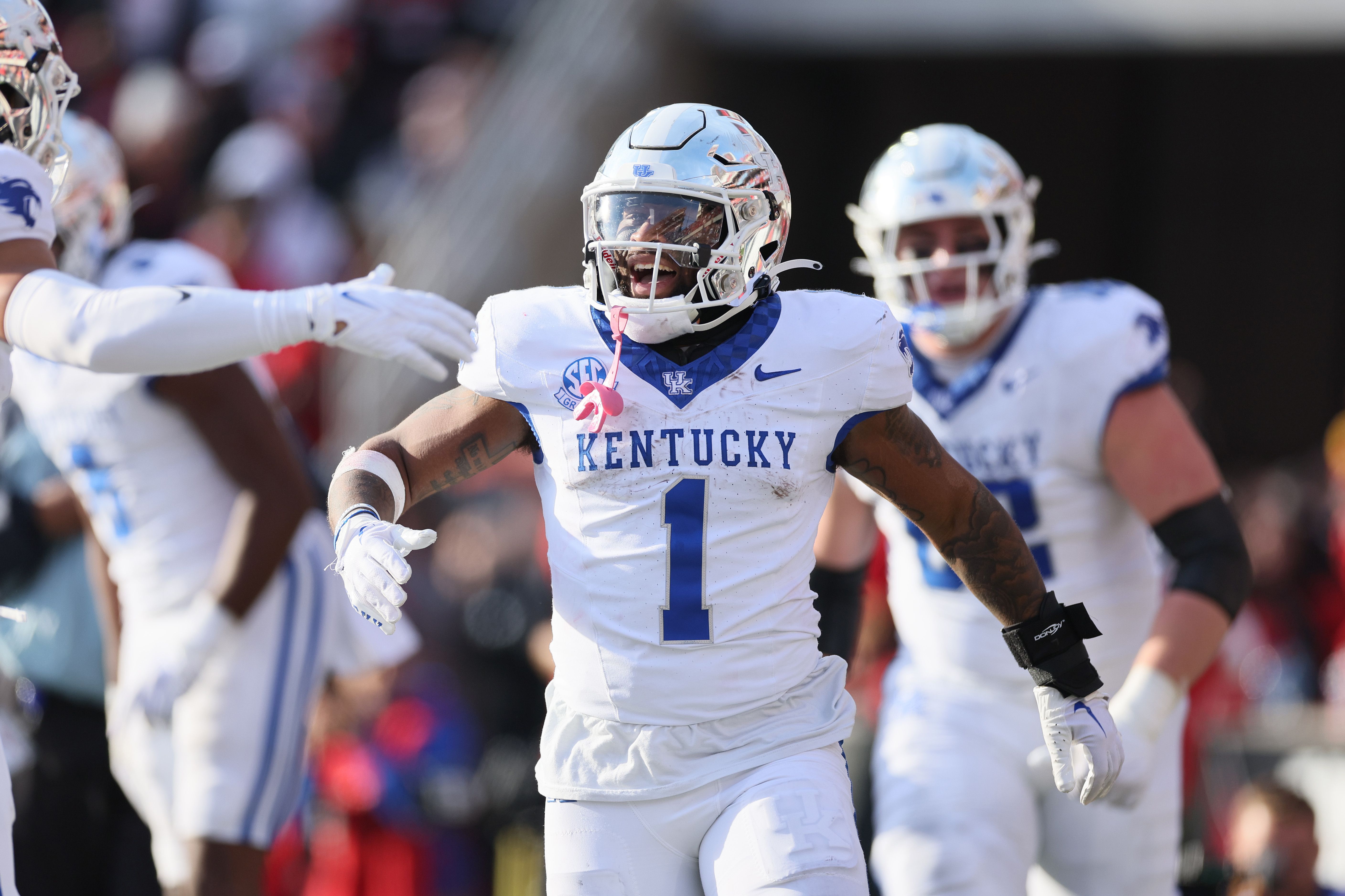 Ray Davis #1 of the Kentucky Wildcats celebrates after running for a touchdown against the Louisville Cardinals in the second half at L&N Stadium on November 25, 2023 in Louisville, Kentucky. (Photo by Andy Lyons/Getty Images)
