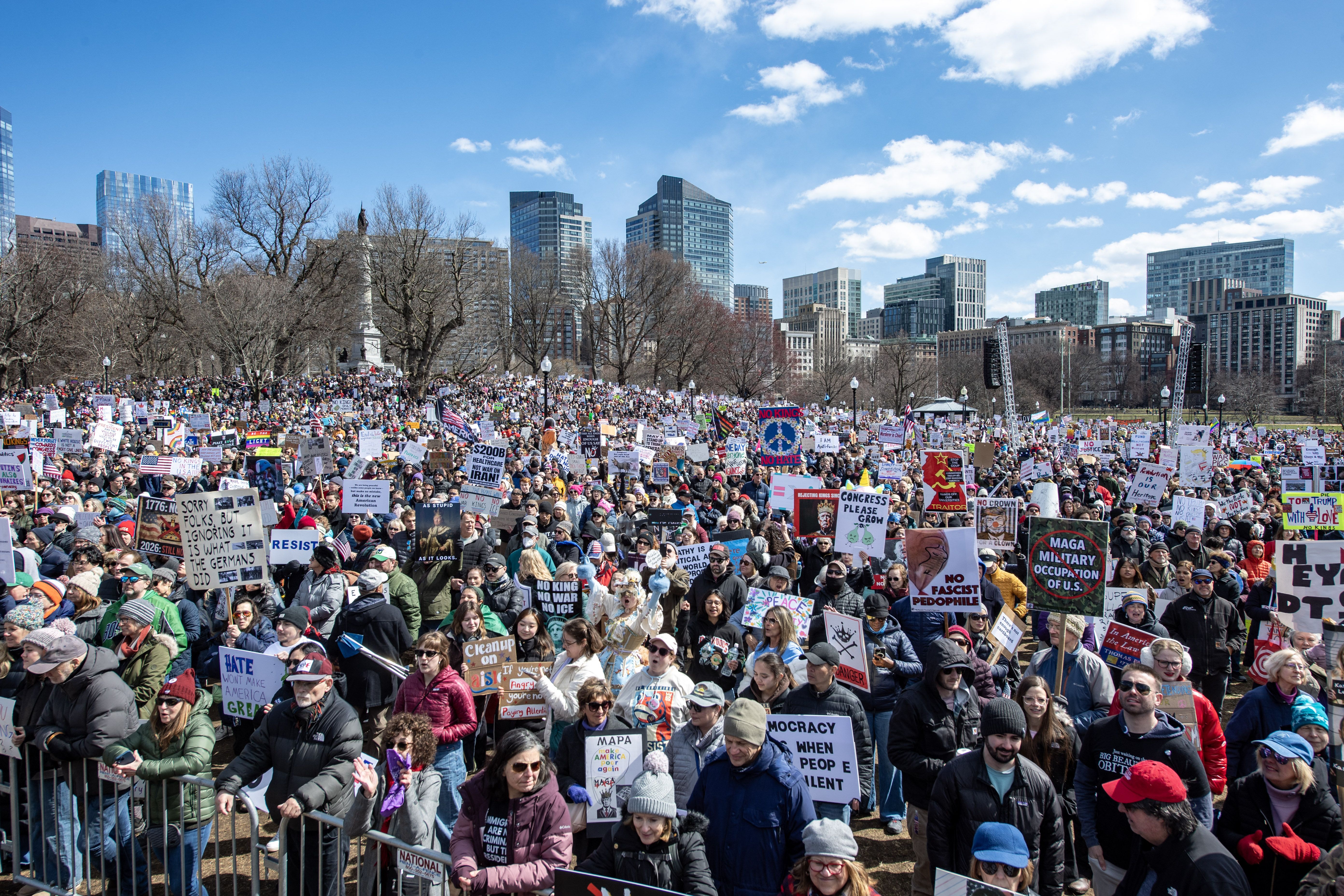 Crowds of protesters holding sign extend across Boston Common for the "No Kings" national day of protest in Boston on March 28, 2026.