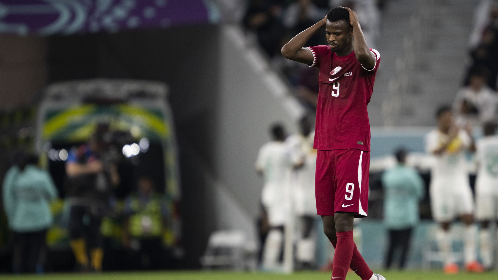 Mohammed Muntari of Qatar shows dejection after Senegals third goal during the FIFA World Cup Qatar 2022 Group A match between Qatar and Senegal