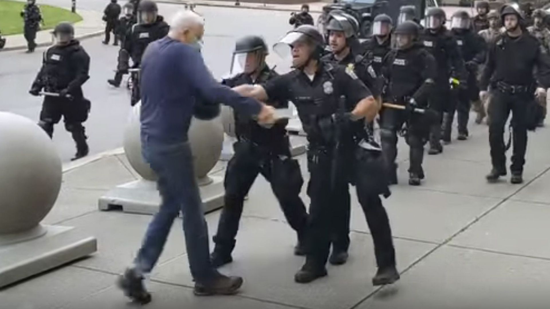 Buffalo police can be seen shoving an elderly protester