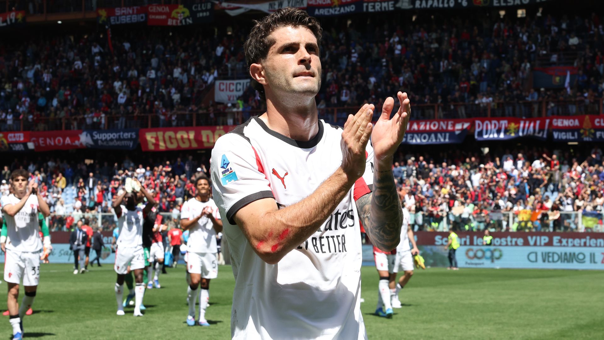 Soccer star Christian Pulisic celebrates after a match between Genoa CFC and AC Milan at Luigi Ferraris Stadium.