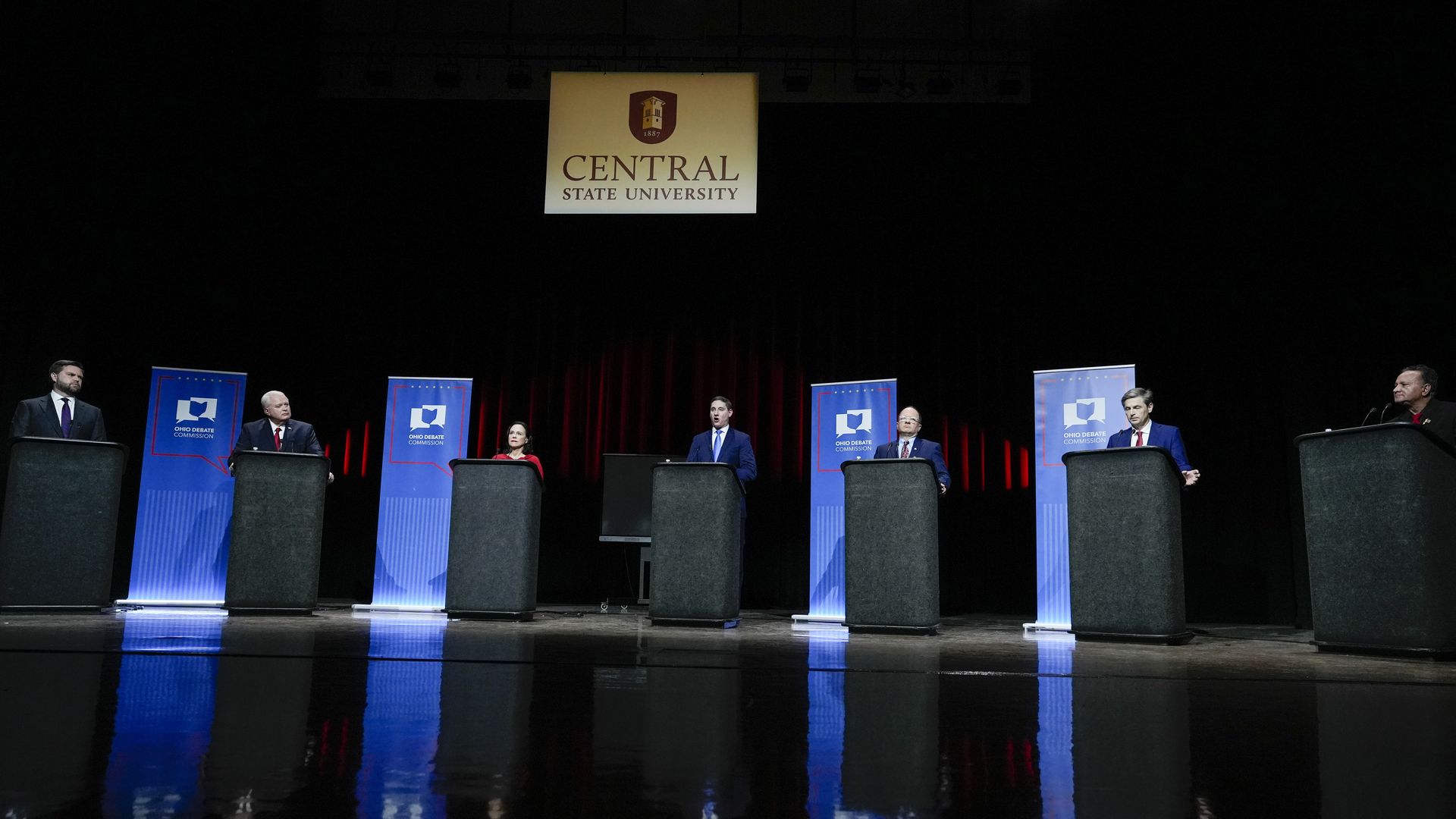 The candidates stand on stage during closing remarks of Ohio's U.S. Senate Republican Primary debate, Monday, March 28, 2022, at Central State University in Wilberforce, Ohio.