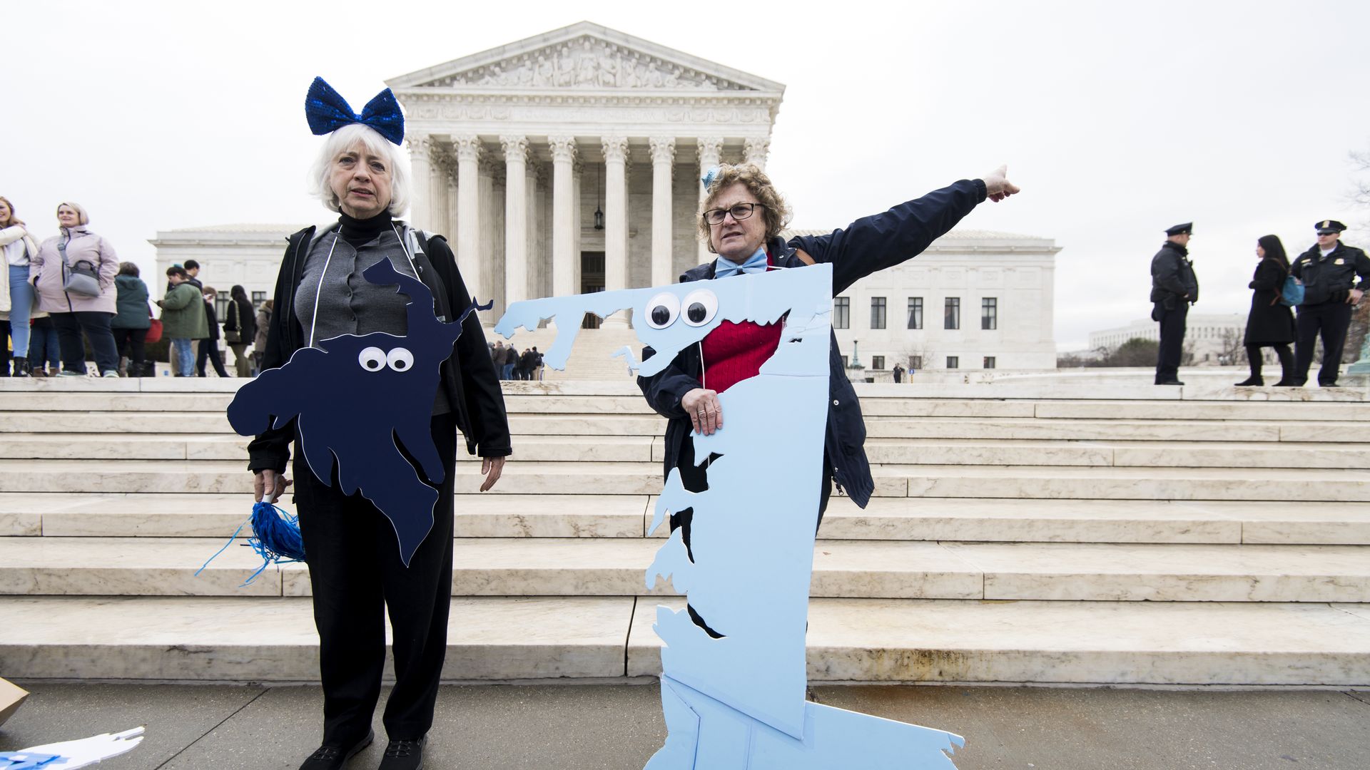 Demonstrators outside the Supreme Court as it prepares to hear a redistricting case.  Photo: Bill Clark/CQ Roll Call 