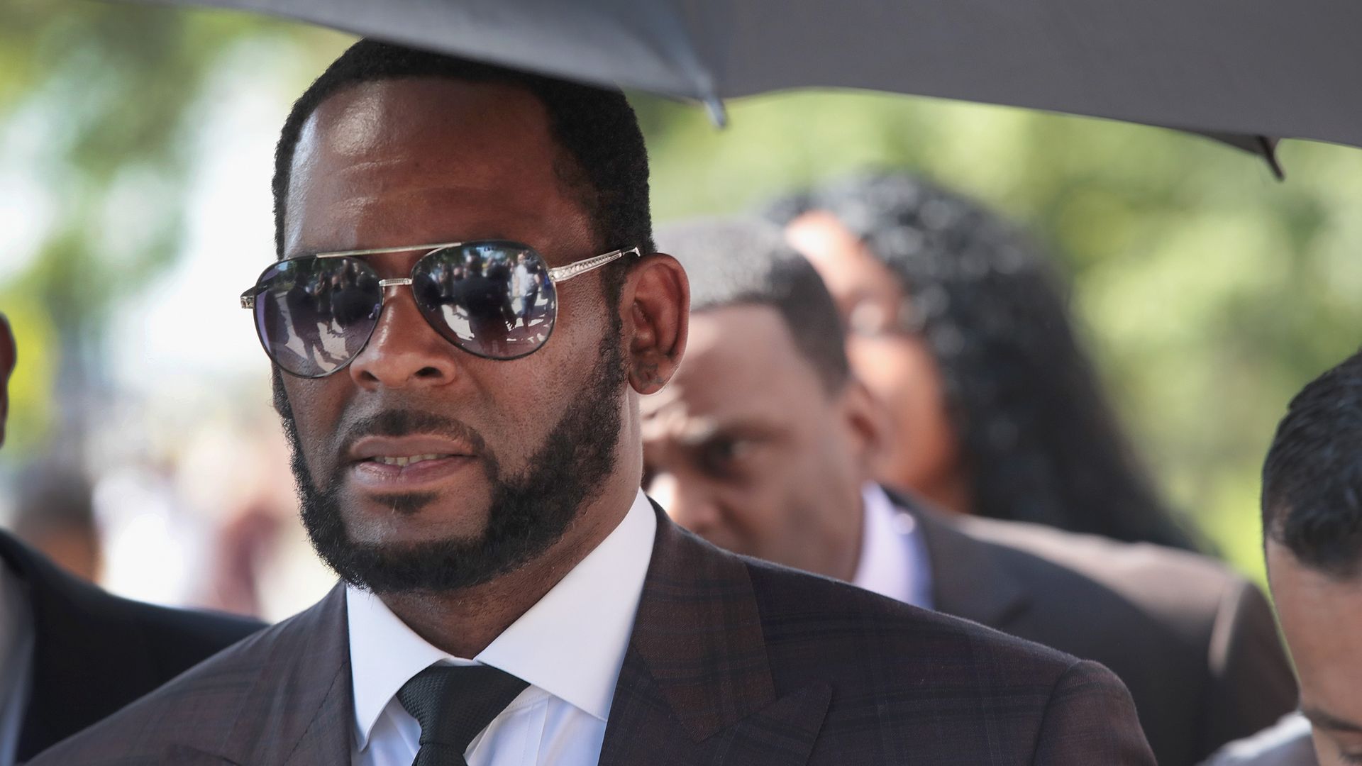 R. Kelly leaves the Leighton Criminal Courts Building following a hearing on June 26, 2019 in Chicago