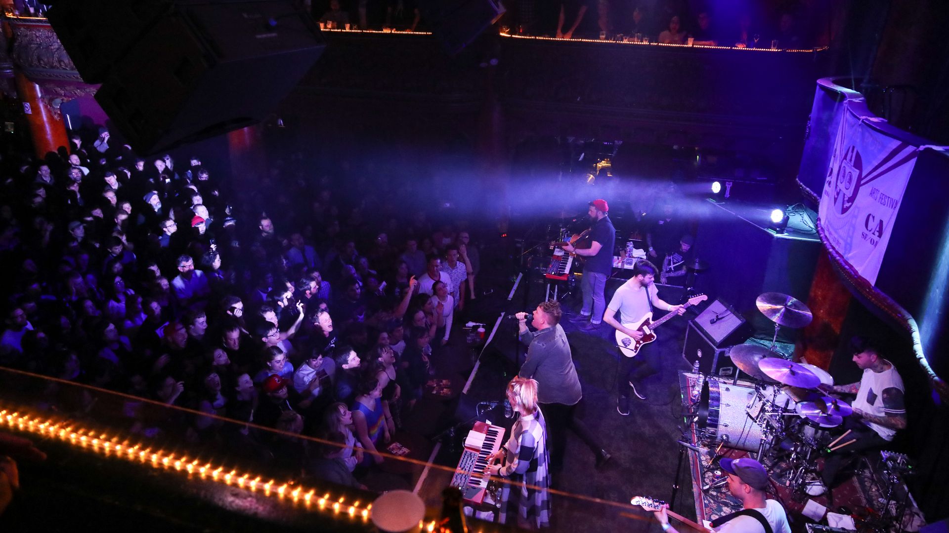 a crowd gathers for a concert