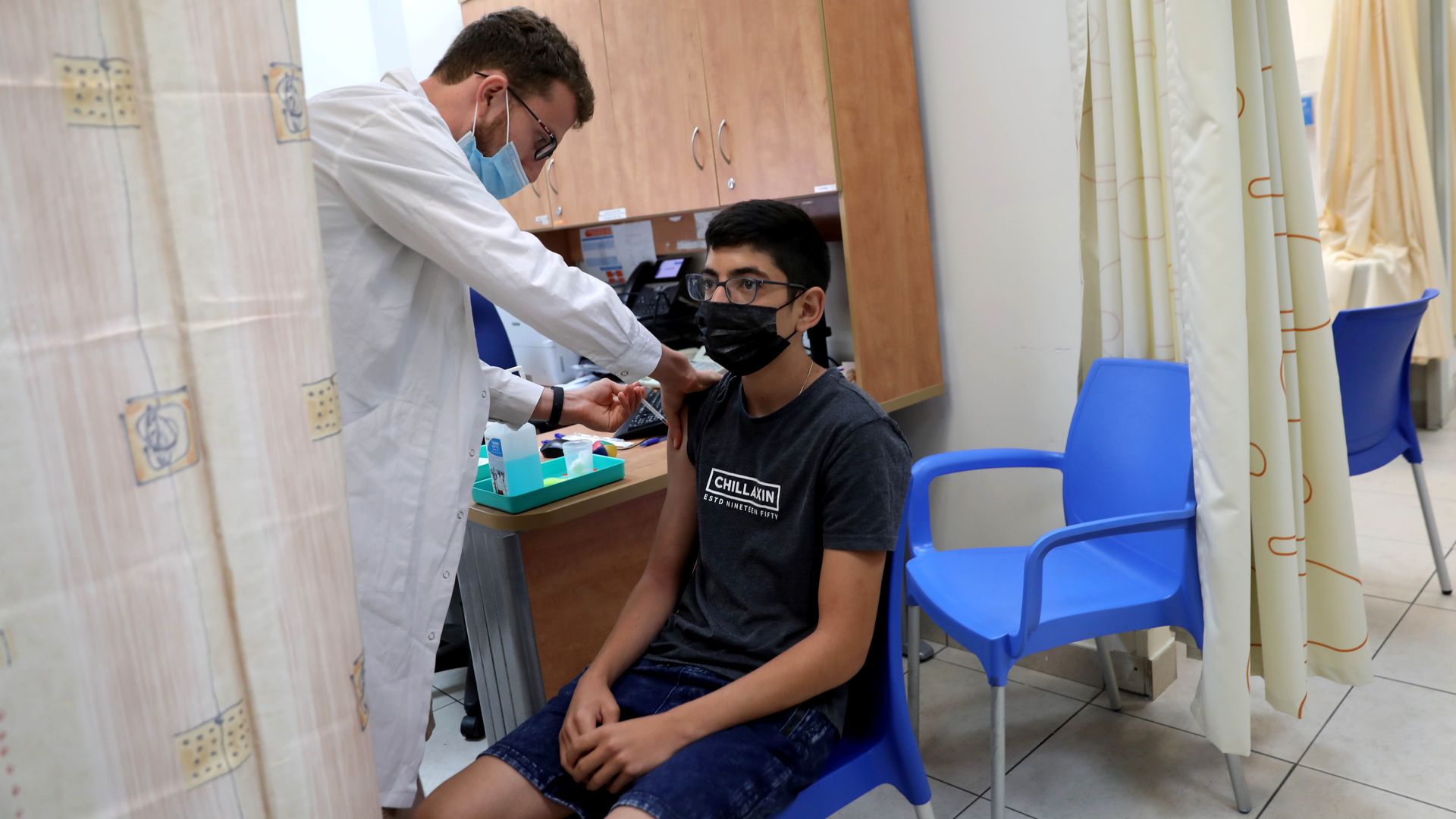A health care worker administering a coronavirus vaccine in Modi'in-Maccabim-Re'ut, Israel, on July 5.