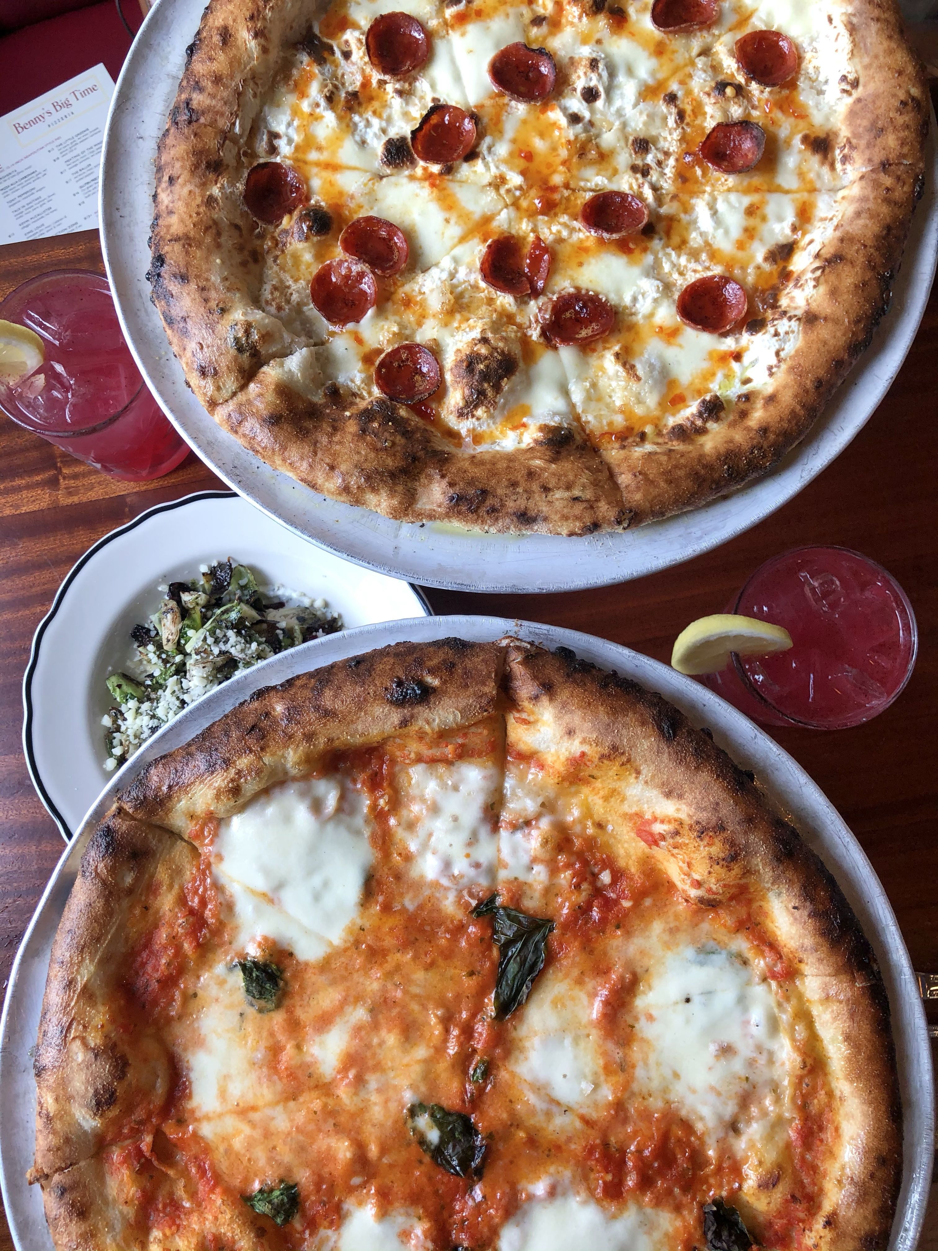 two pizzas and cocktails from bennys big time in wilmington