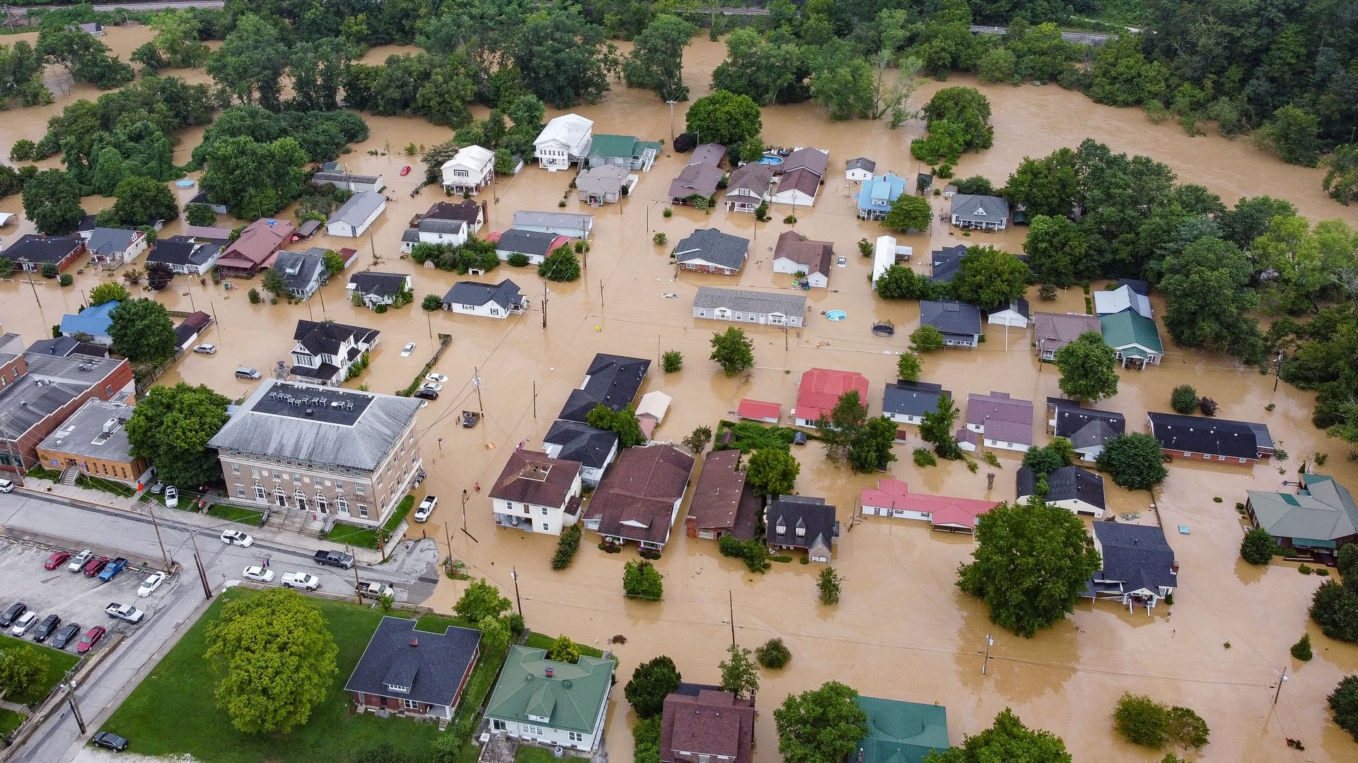 Aerial view of homes submerged under flood waters from the North Fork of the Kentucky River in Jackson, Kentucky, on July 28.