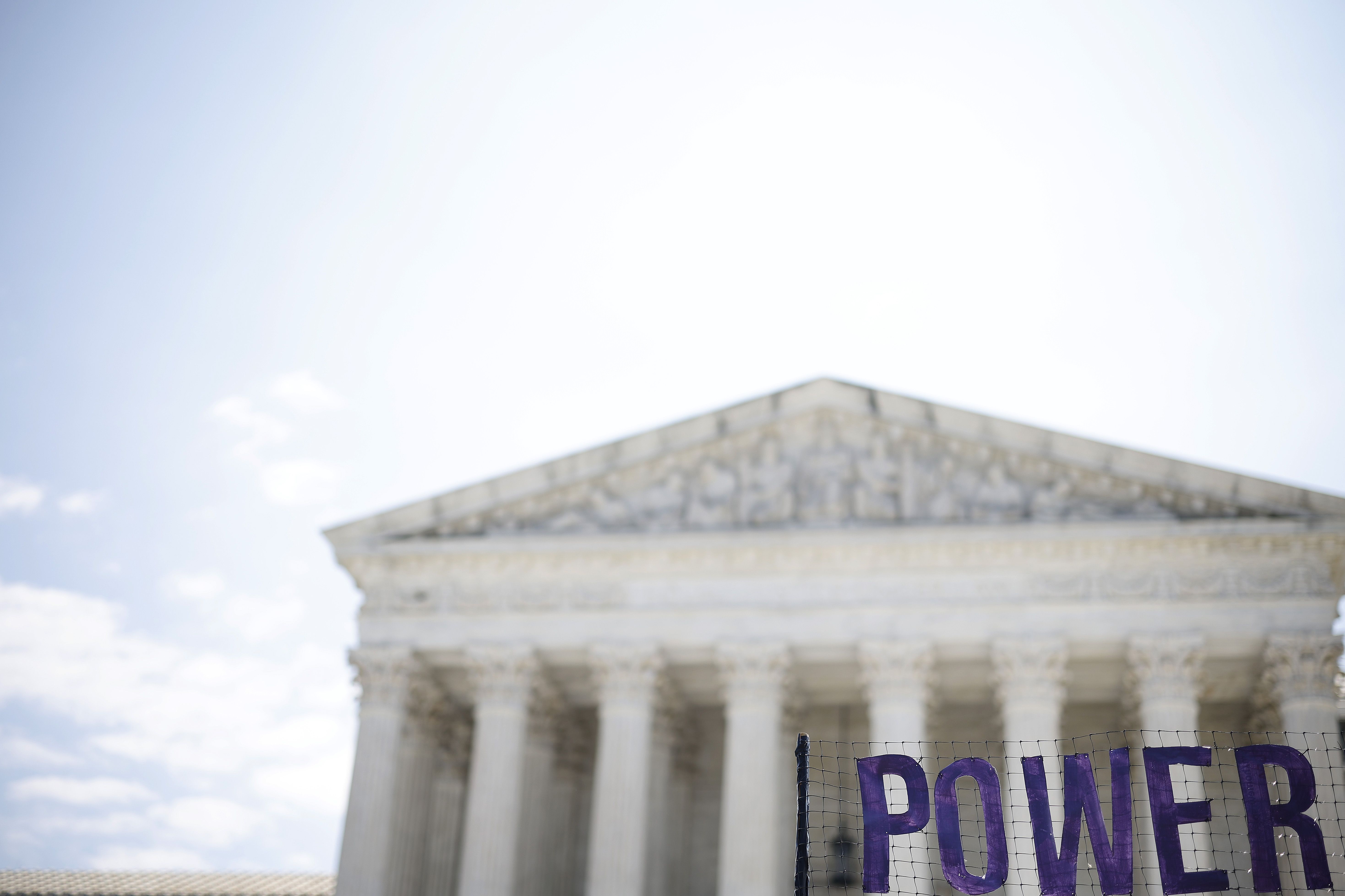 Sign saying "POWER" outside Supreme Court