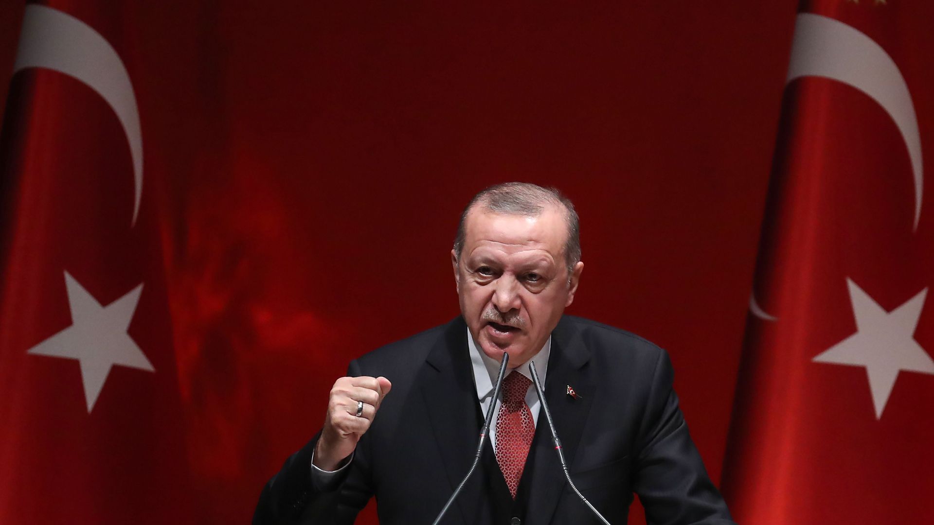 Turkey's president Recep Tayyip Erdogan delivers a speech.