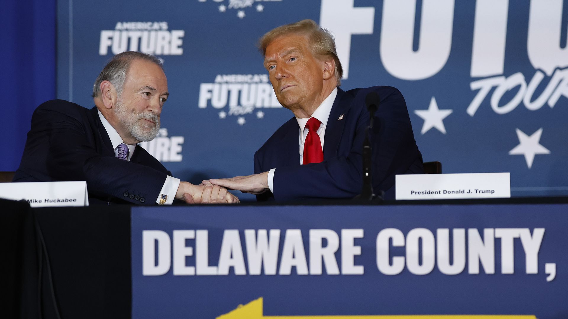Republican presidential nominee, former U.S. President Donald Trump (R) participates in a roundtable discussion with former Arkansas Governor Mike Huckabee at the Drexelbrook Catering & Event Center on October 29, 2024