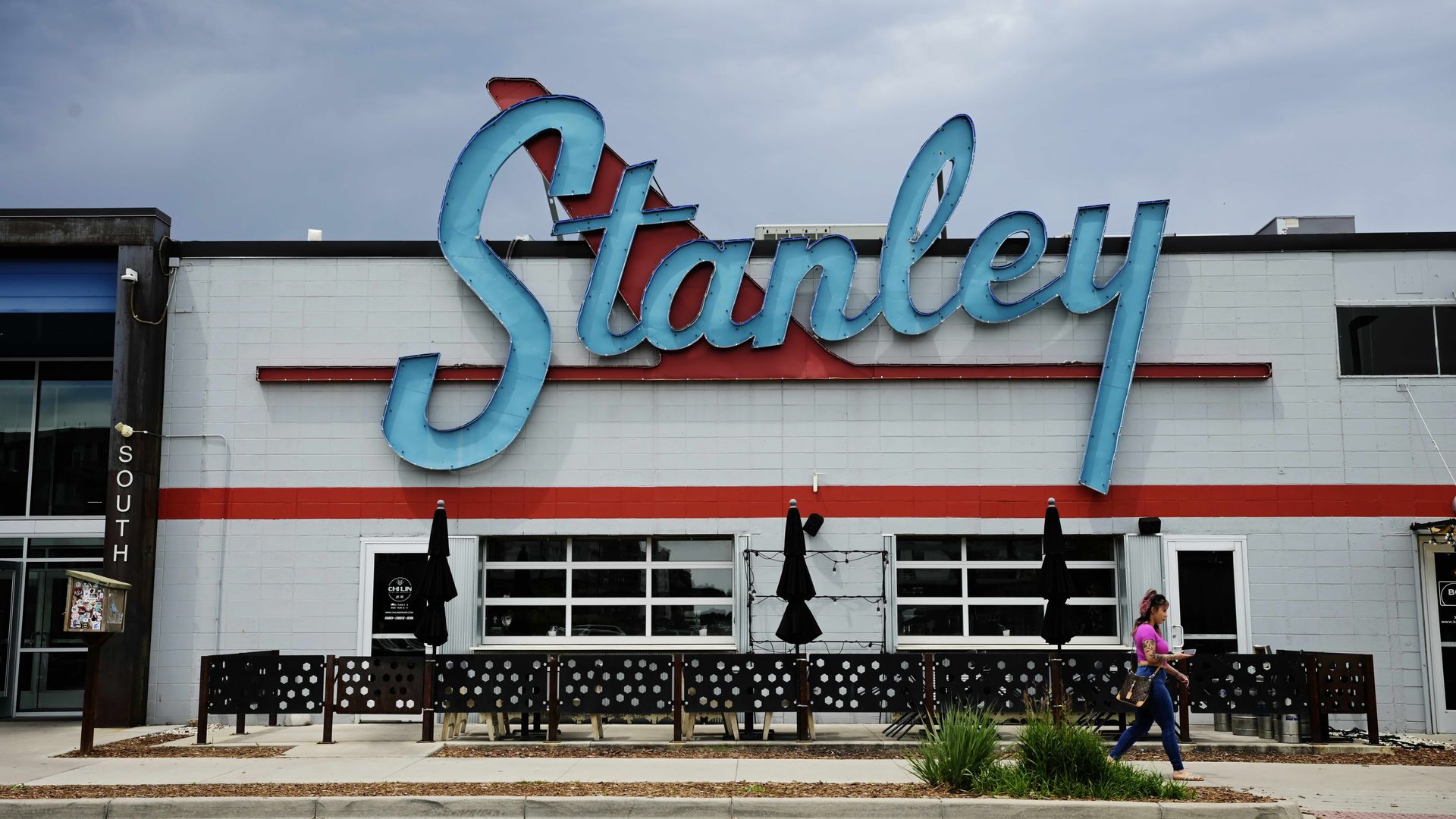 A photo of the exterior of Stanley Marketplace, featuring a big blue logo that reads "Stanley."