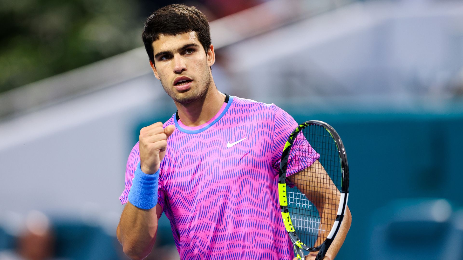 Carlos Alcaraz on the tennis court.