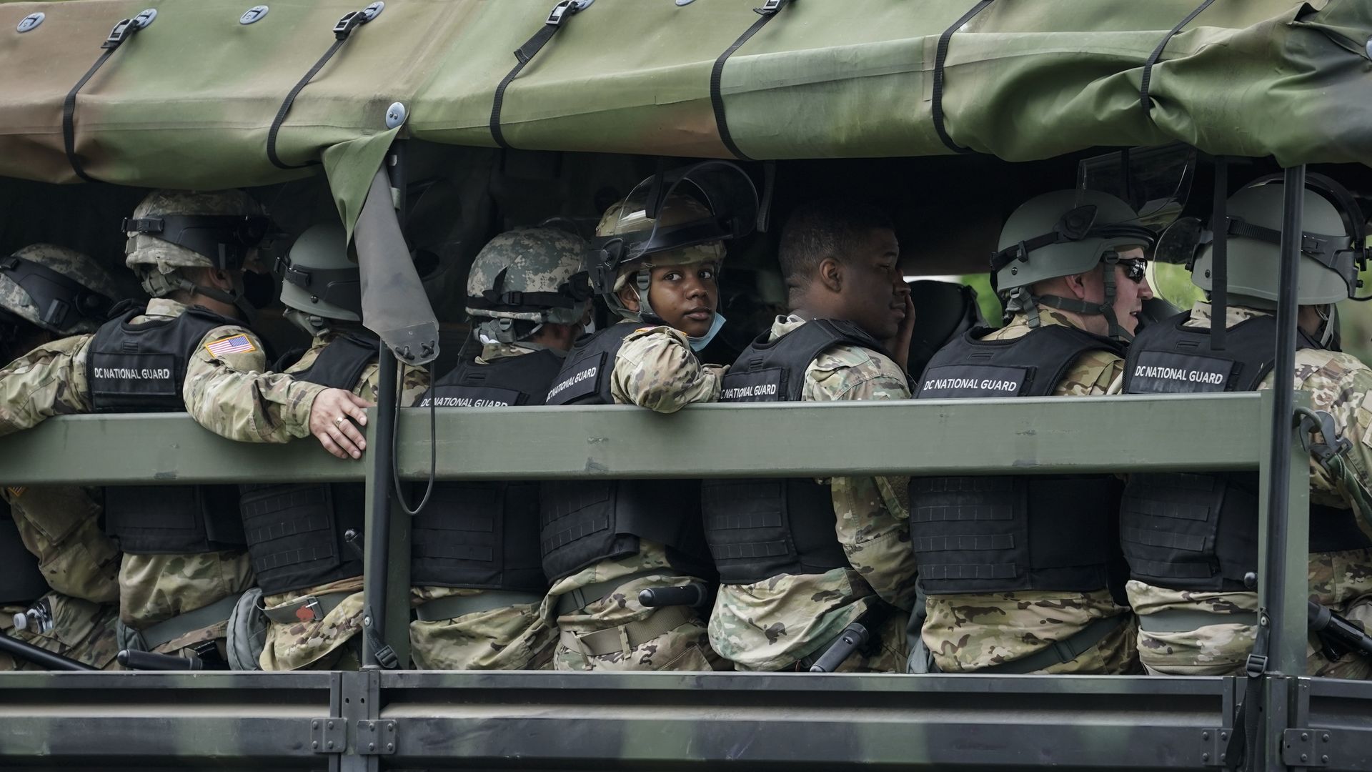 Troops wait aboard personnel carriers to take them toward the city from the Joint Force Headquarters of the D.C. National Guard on June 2, 2020 in Washington, DC.