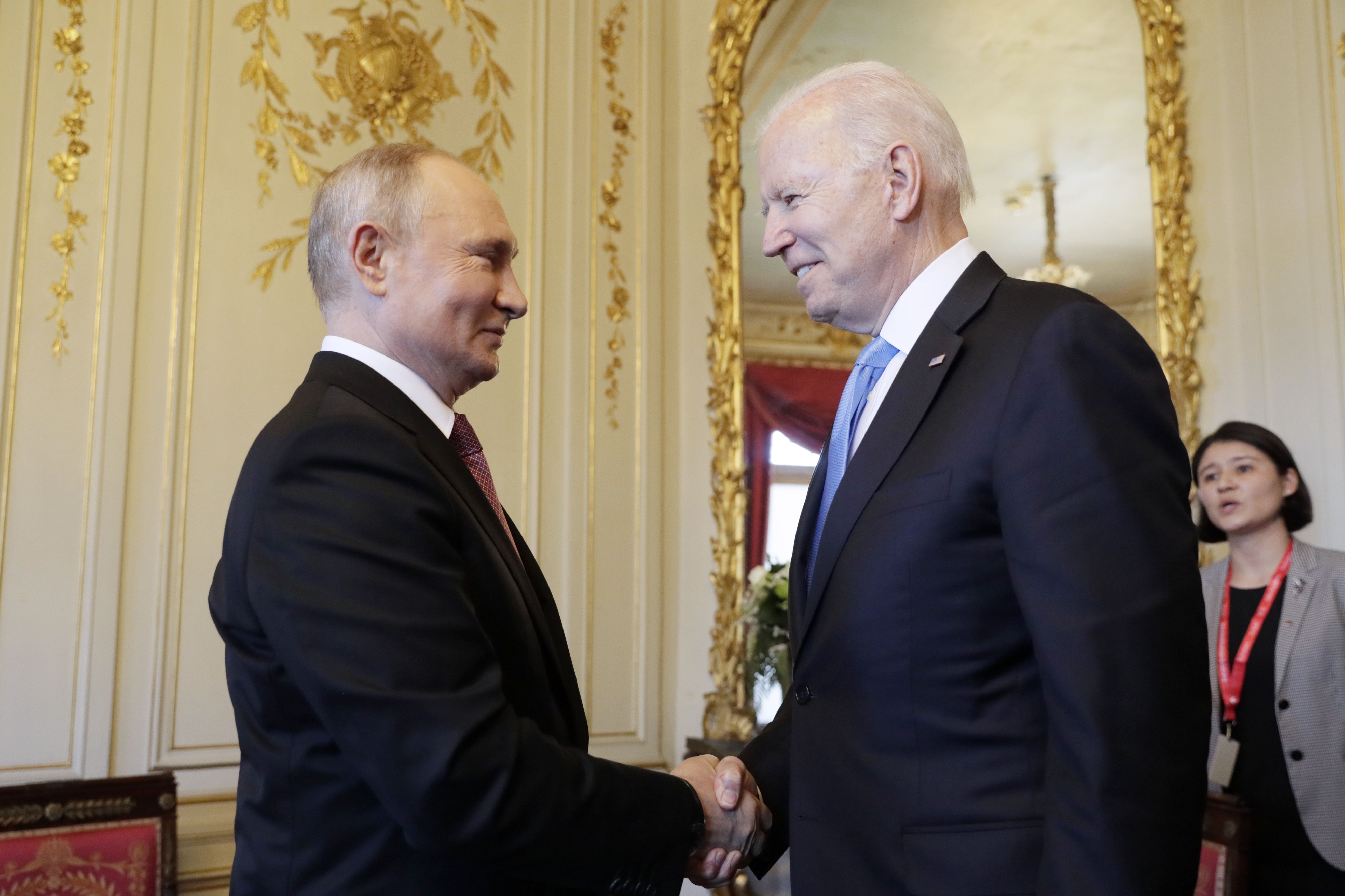 Putin and Biden shake hands