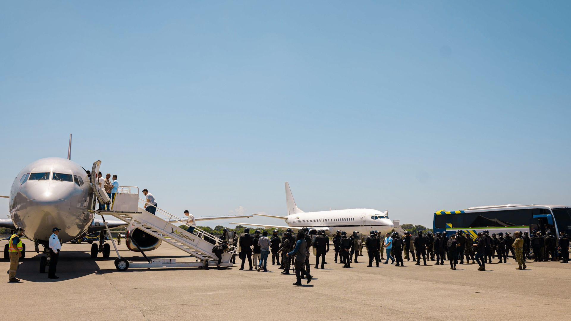 Detained Venezuelans board the flight to Venezuela at San Óscar Arnulfo Romero y Galdámez International Airport as part of a detainee exchange agreement between Venezuela and United States on July 18, 2025.