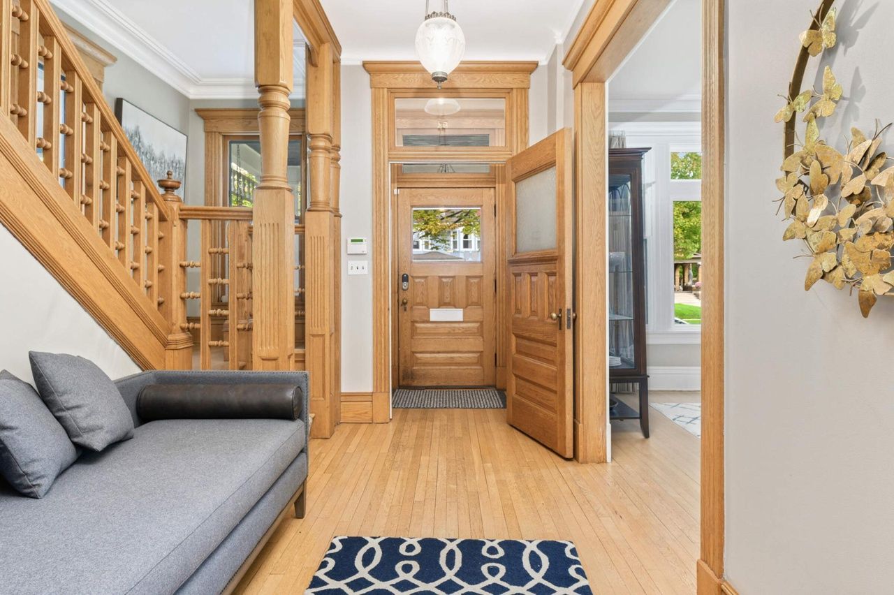 entryway with detailed woodwork