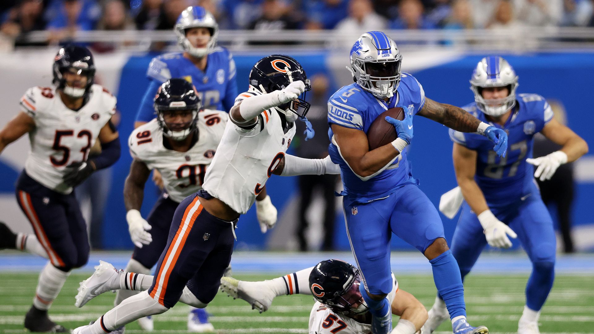 Lions RB David Montgomery runs with the ball against the Bears at Ford Field yesterday
