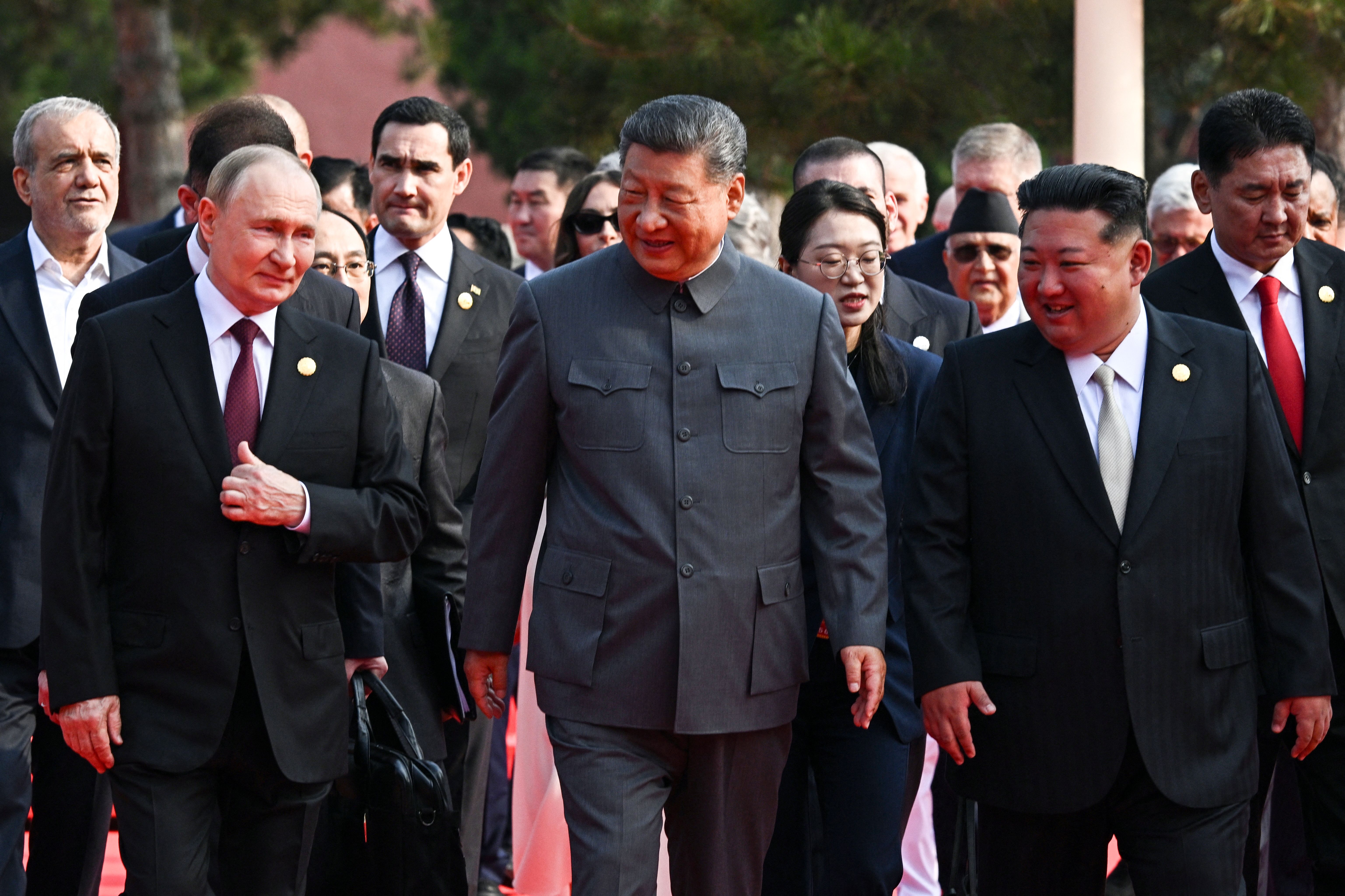 three men walking