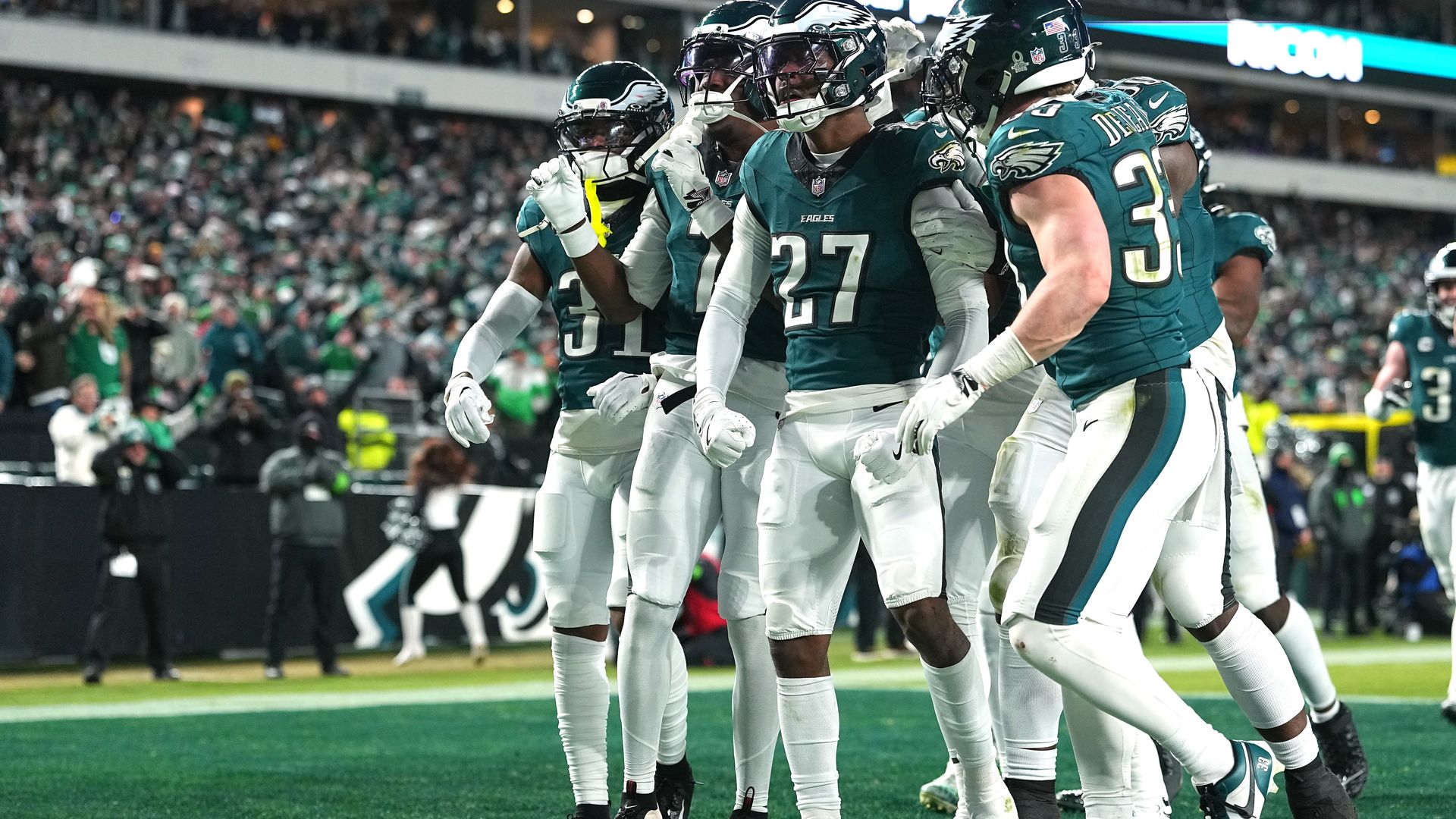 The Eagles' Quinyon Mitchell celebrate with teammates after an interception against the San Francisco 49ers during last season's wild-card playoff game.