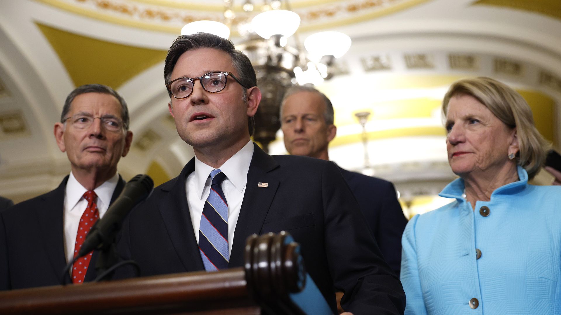 Speaker Johnson speaks to reporters with Senators Barrasso, Thune and Capito behind him in the Capitol 