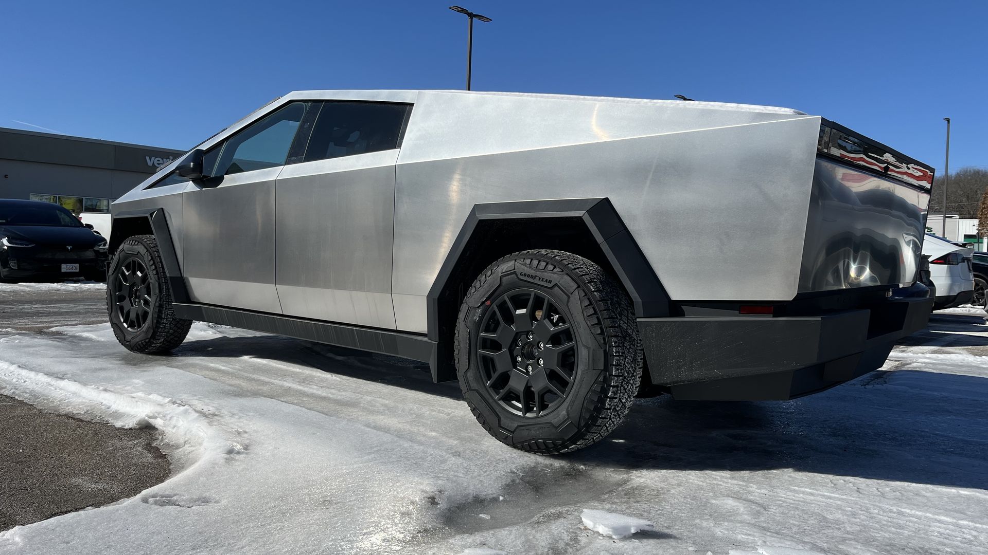 A stainless steel pickup truck