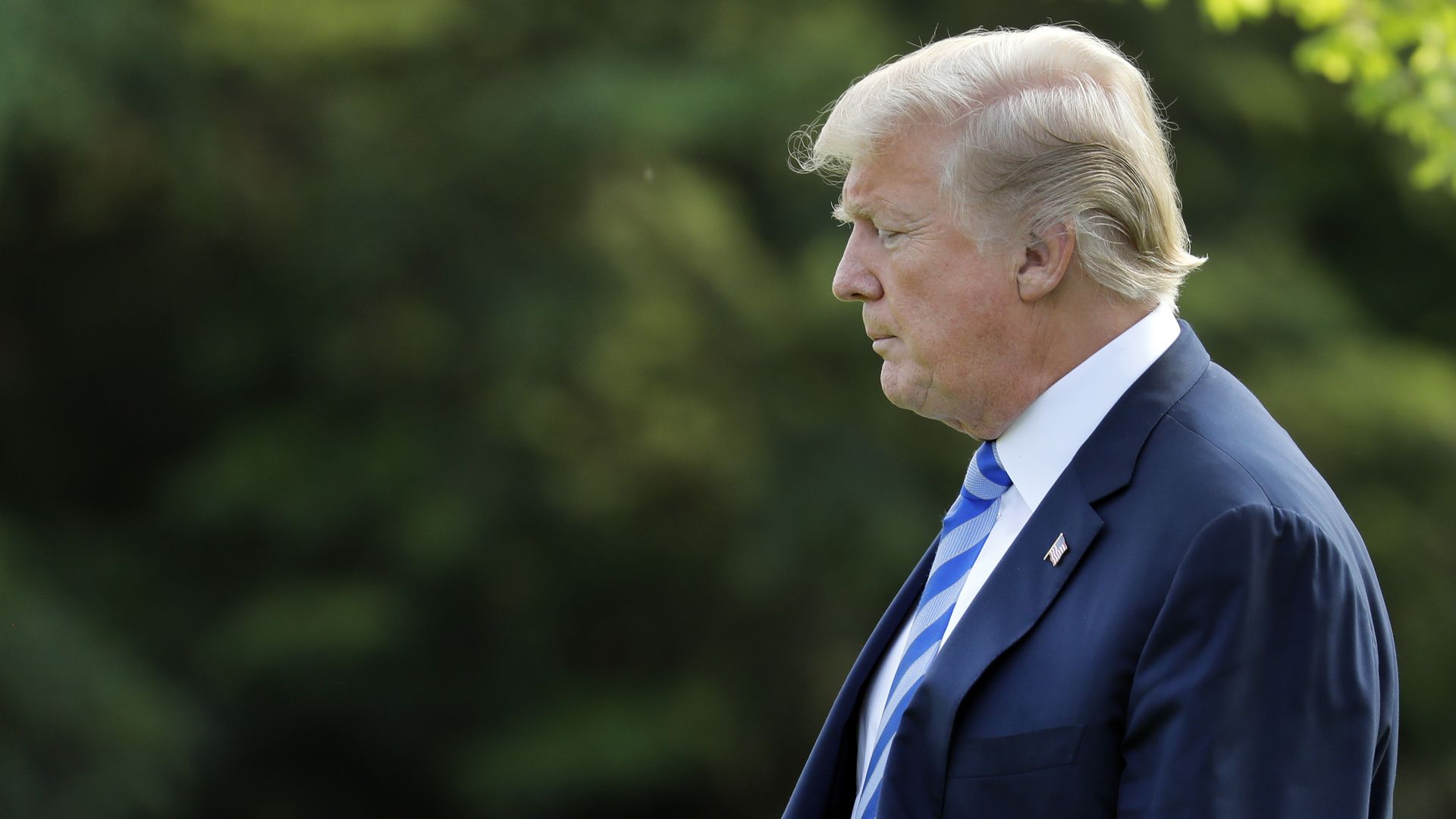 Trump walking on the south lawn of the white house