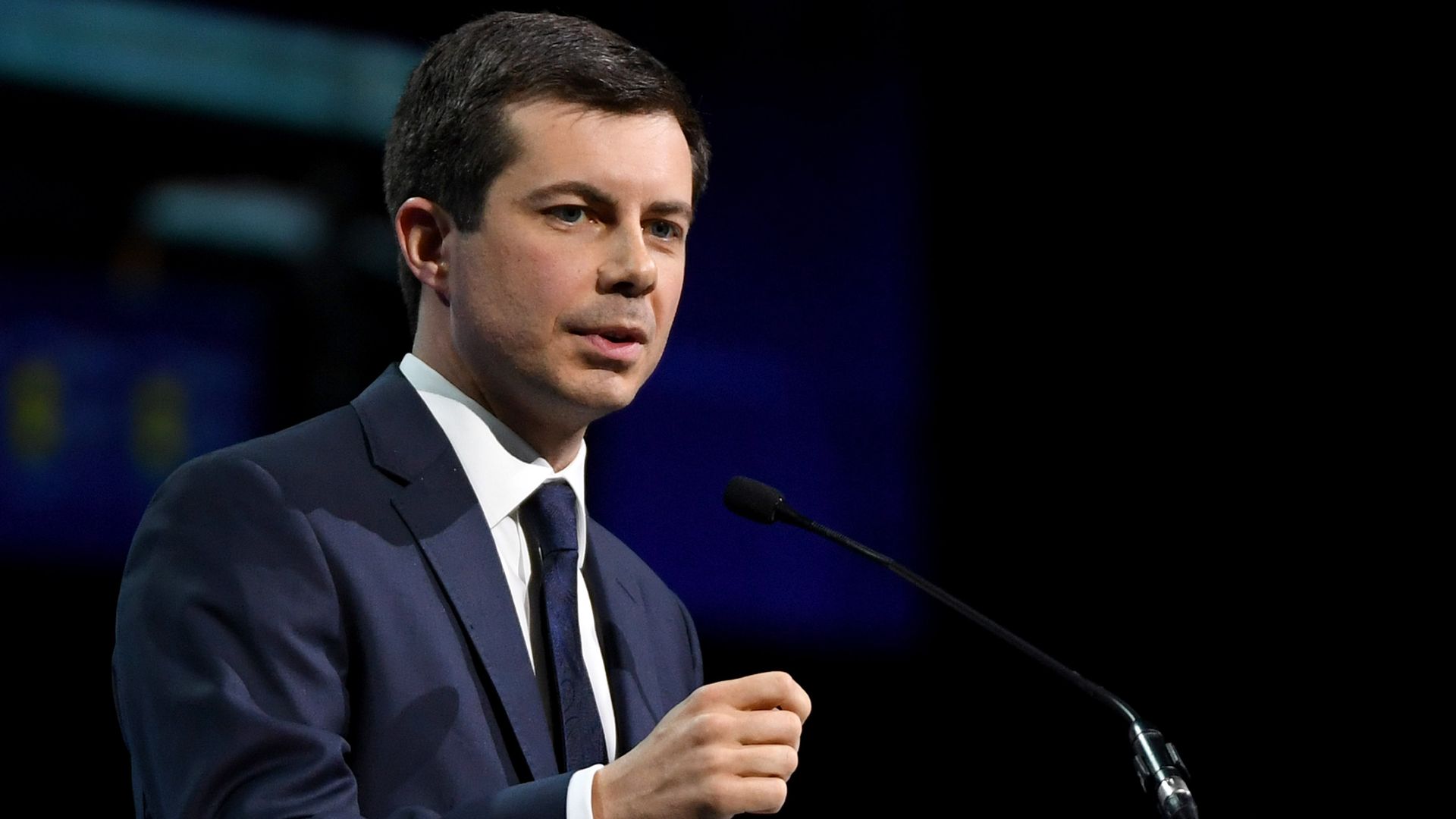 Pete Buttigieg gestures during a speech.