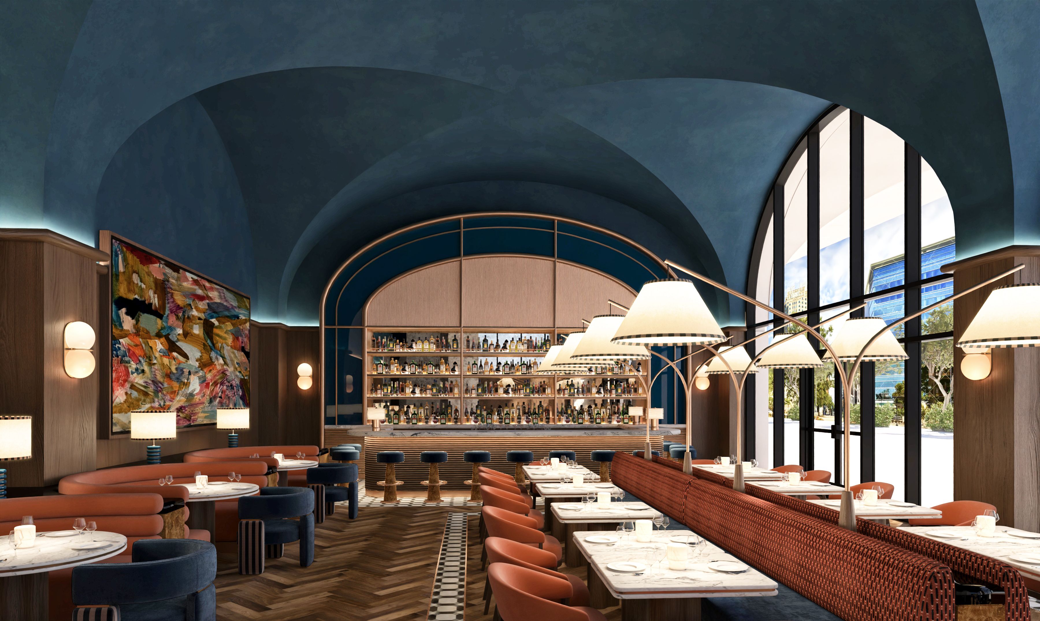 Interior of a chic restaurant with a deep blue vaulted ceiling, curved copper bar, illuminated shelves of bottles, orange and blue seating, and large arched windows letting in daylight.