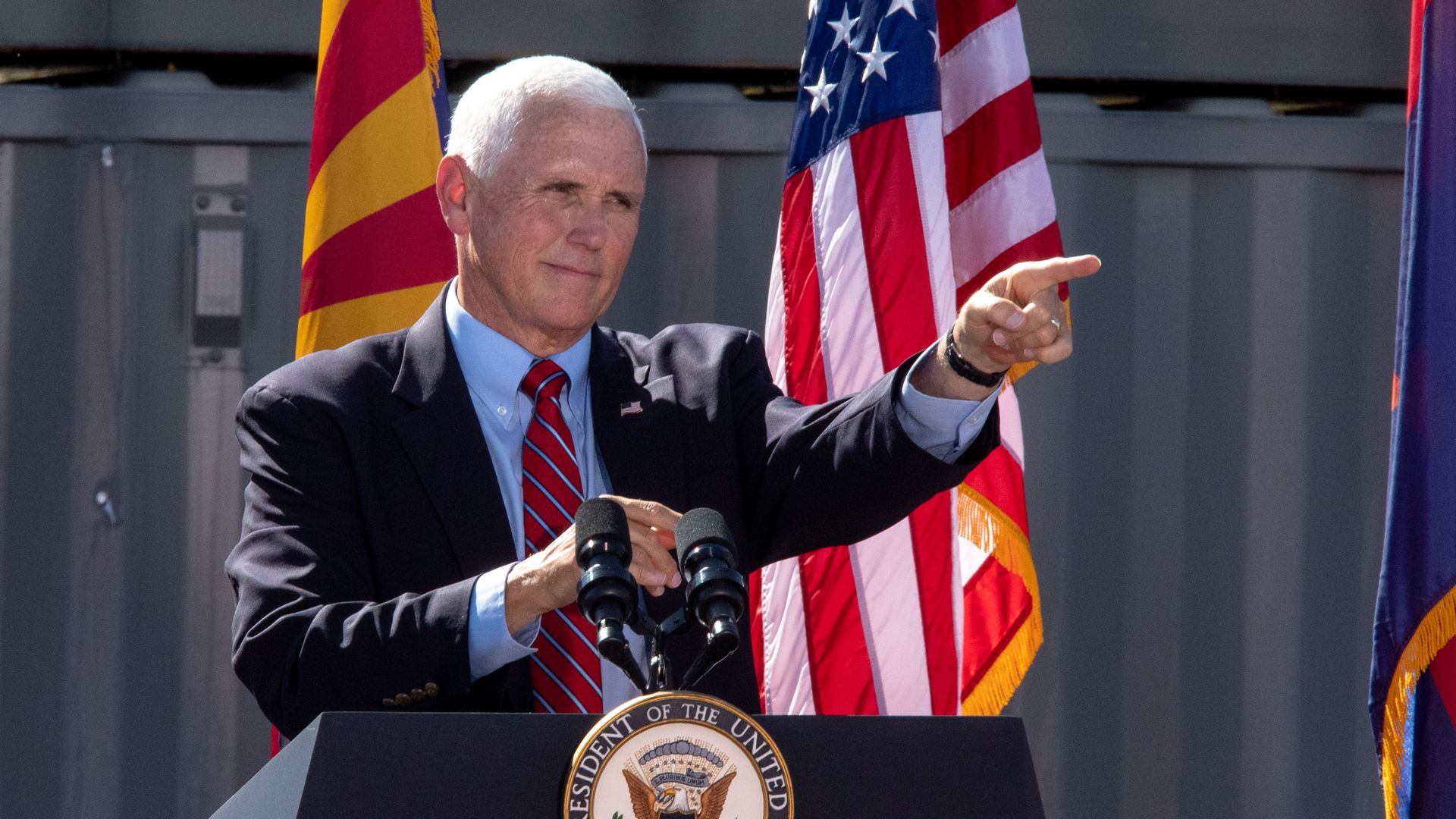 Vice President Mike Pence points to his left during a rally in Peoria Arizona in October 2020